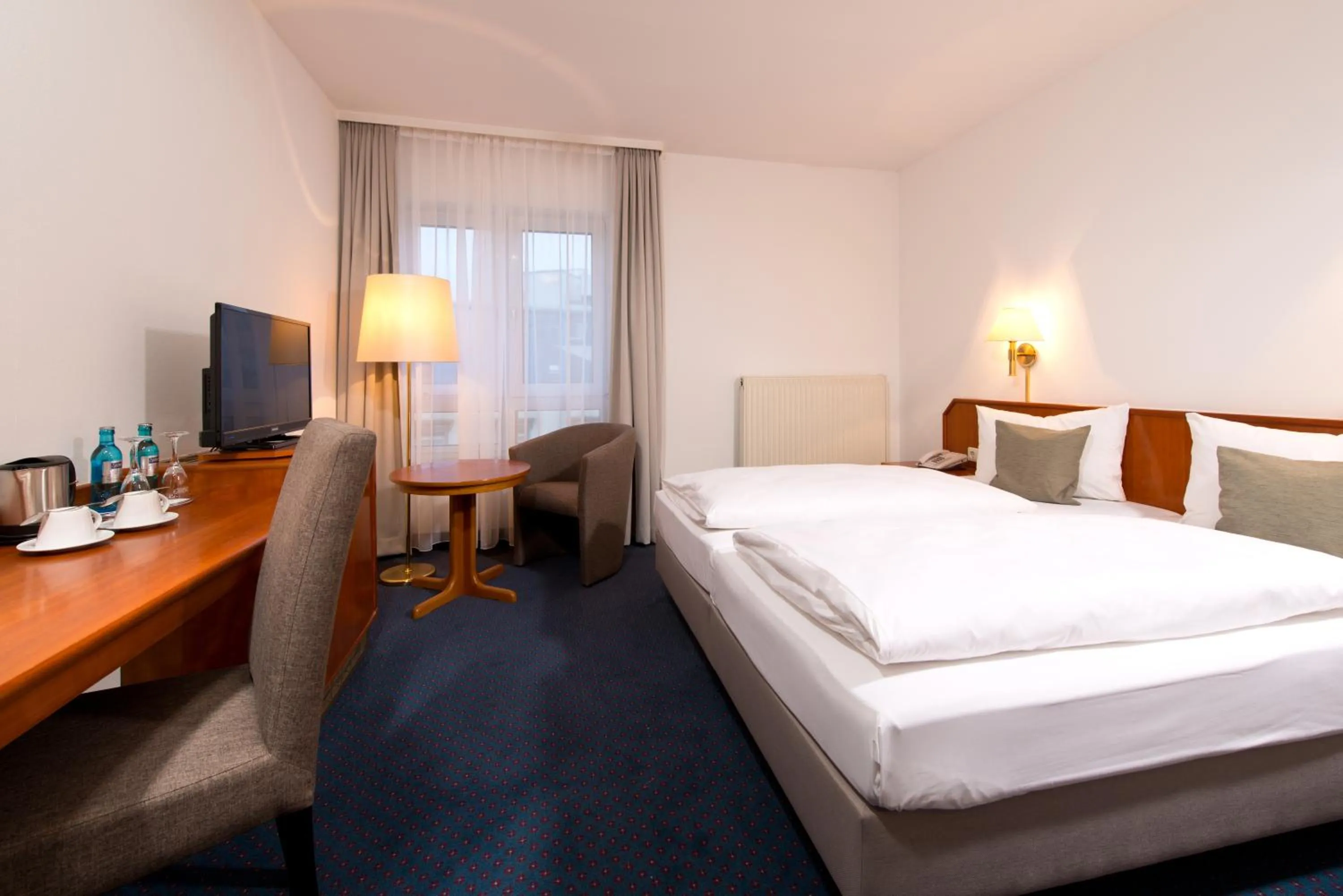 Bed in ACHAT Hotel Neustadt an der Weinstraße