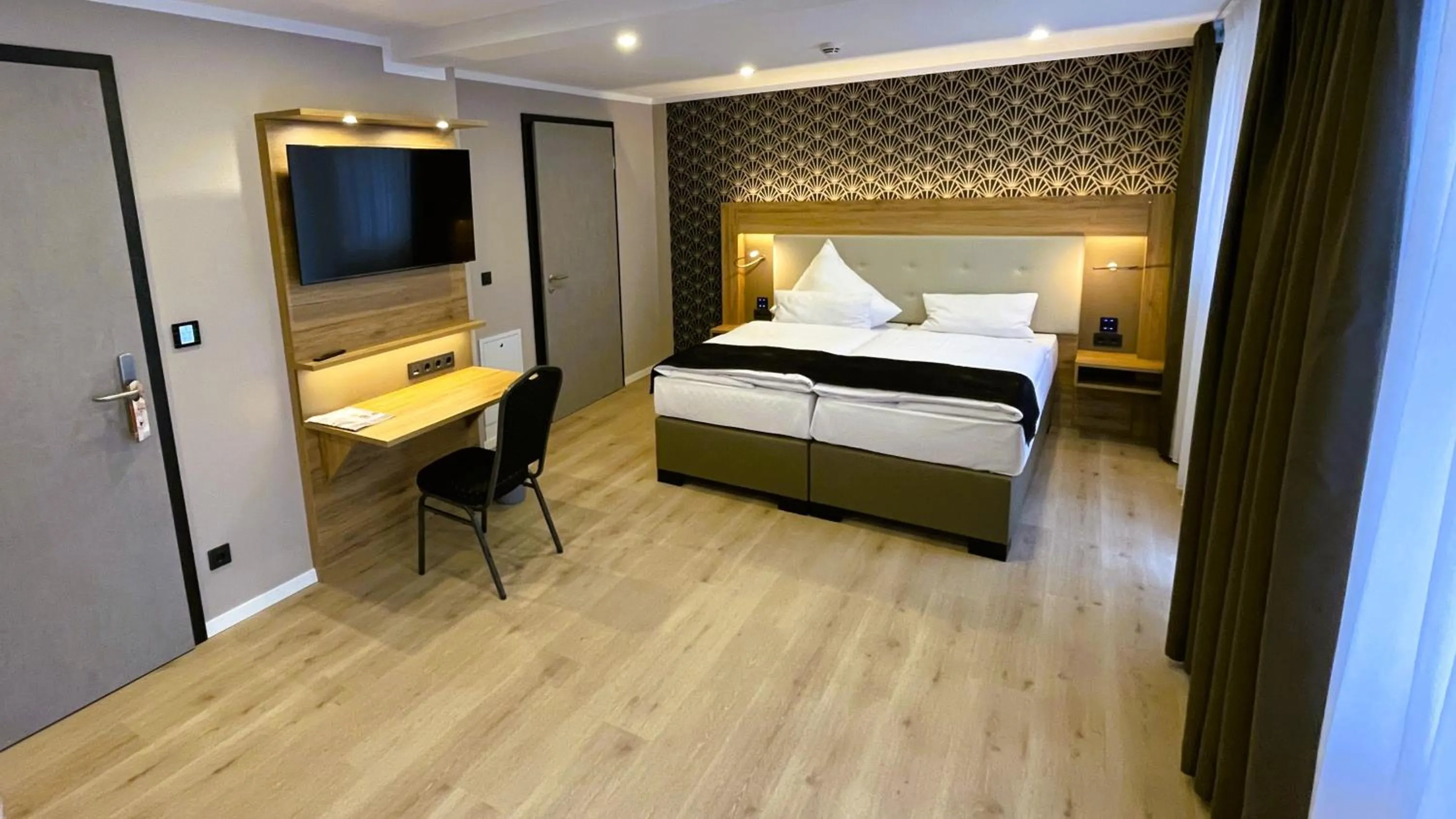 Photo of the whole room, Bed in Akzent Hotel Tietmeyer & Cross Side