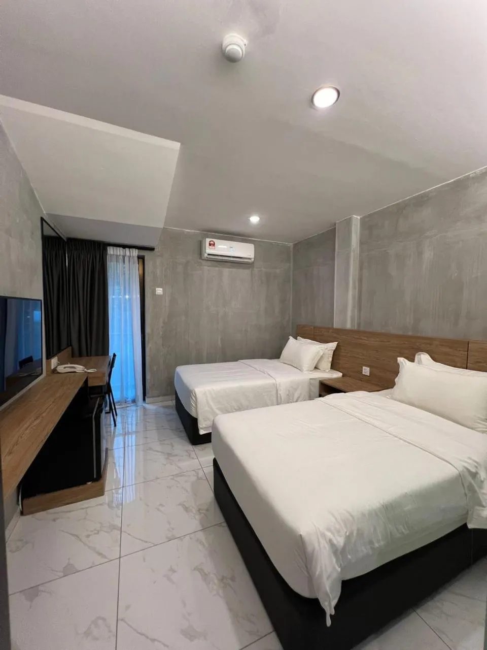 Photo of the whole room, Bed in Tekoma Hotel Ipoh - Dandelion Inn