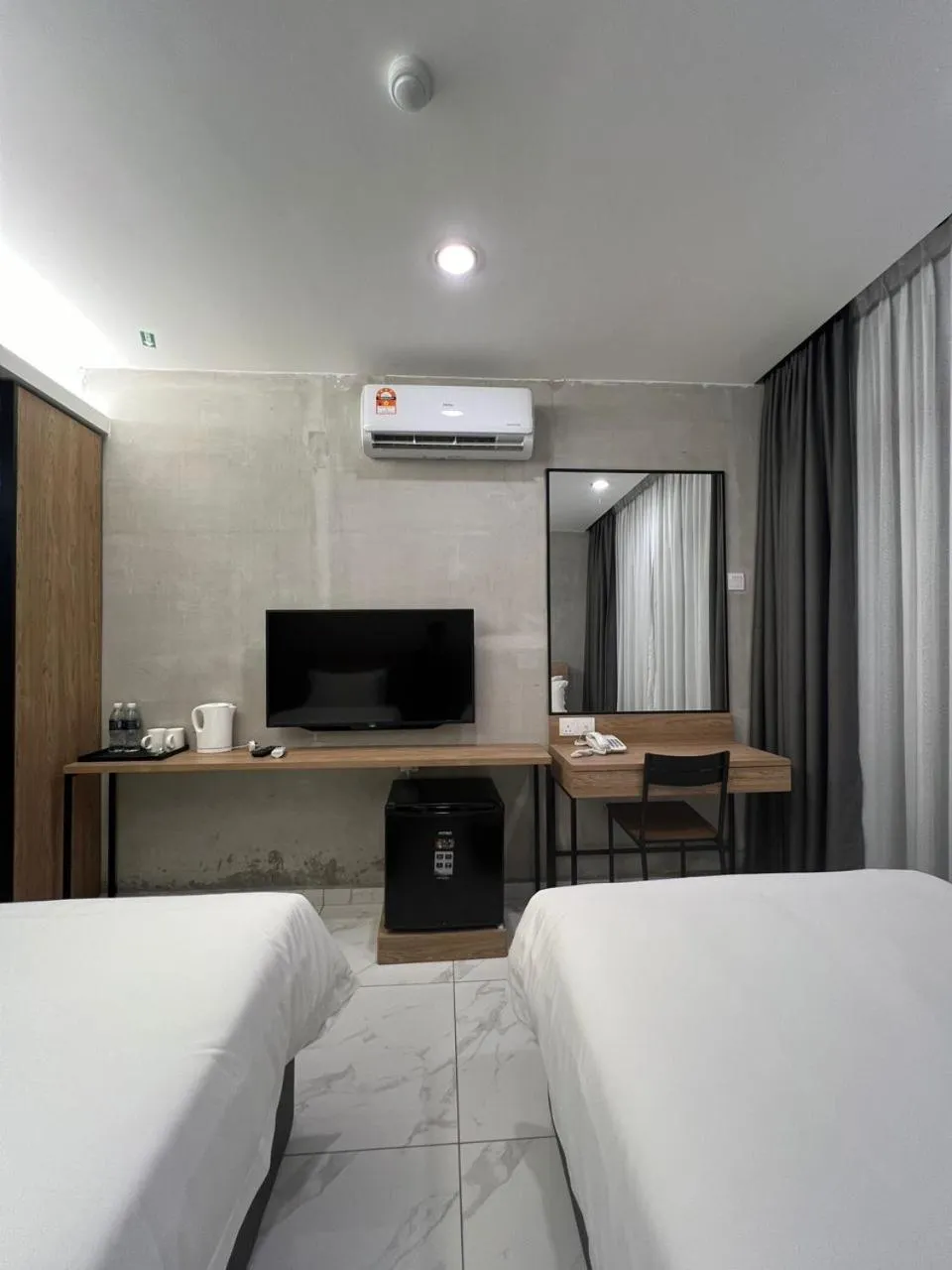 air conditioner, Bed in Tekoma Hotel Ipoh - Dandelion Inn
