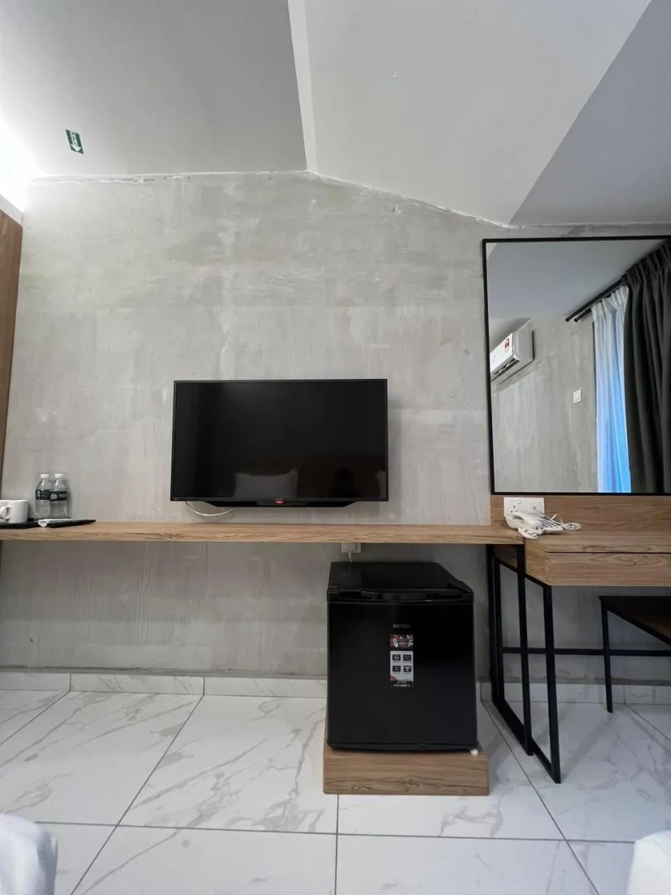 TV and multimedia in Tekoma Hotel Ipoh - Dandelion Inn