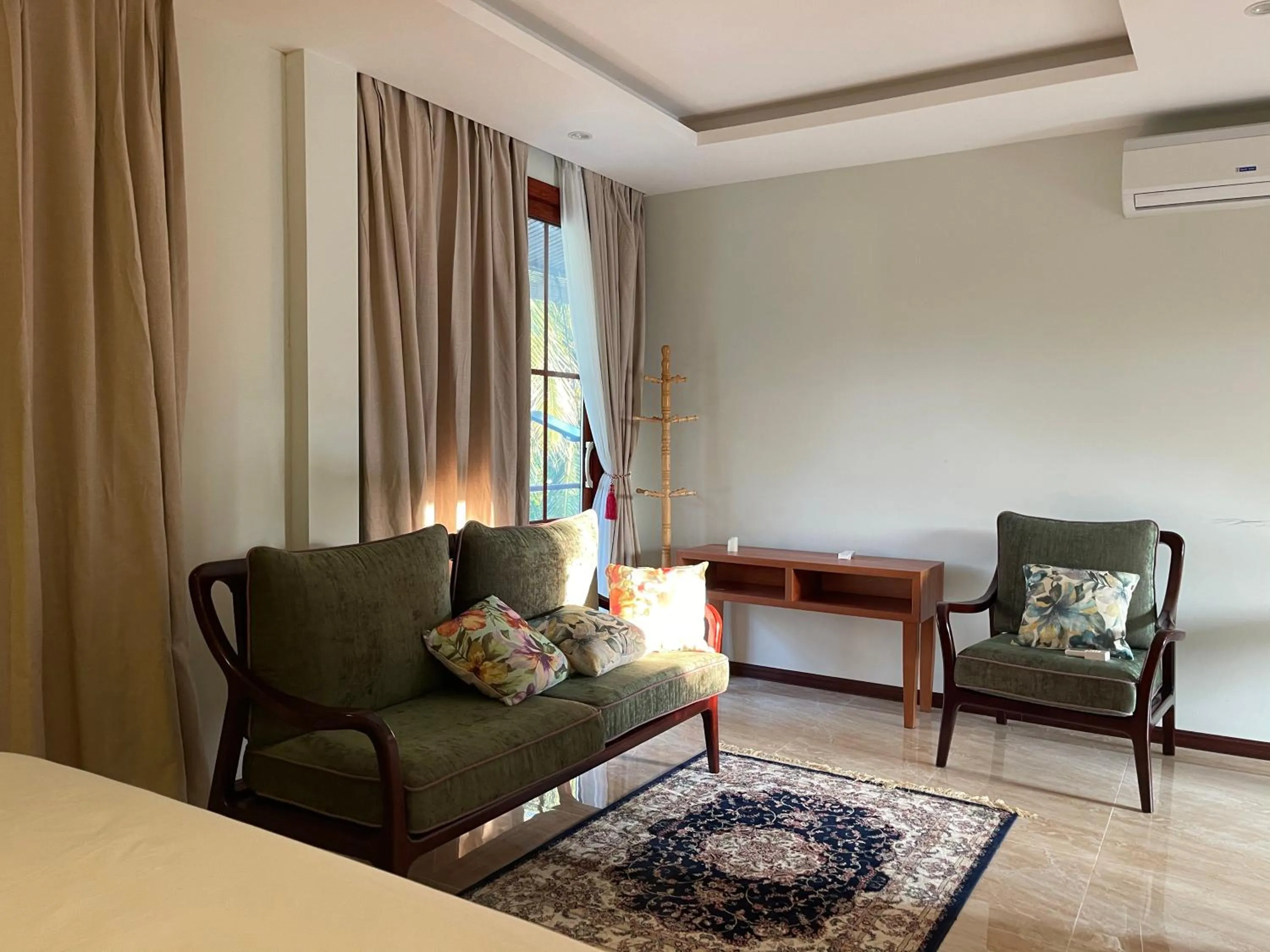 Seating area, Bed in Viluveli Holiday Retreat