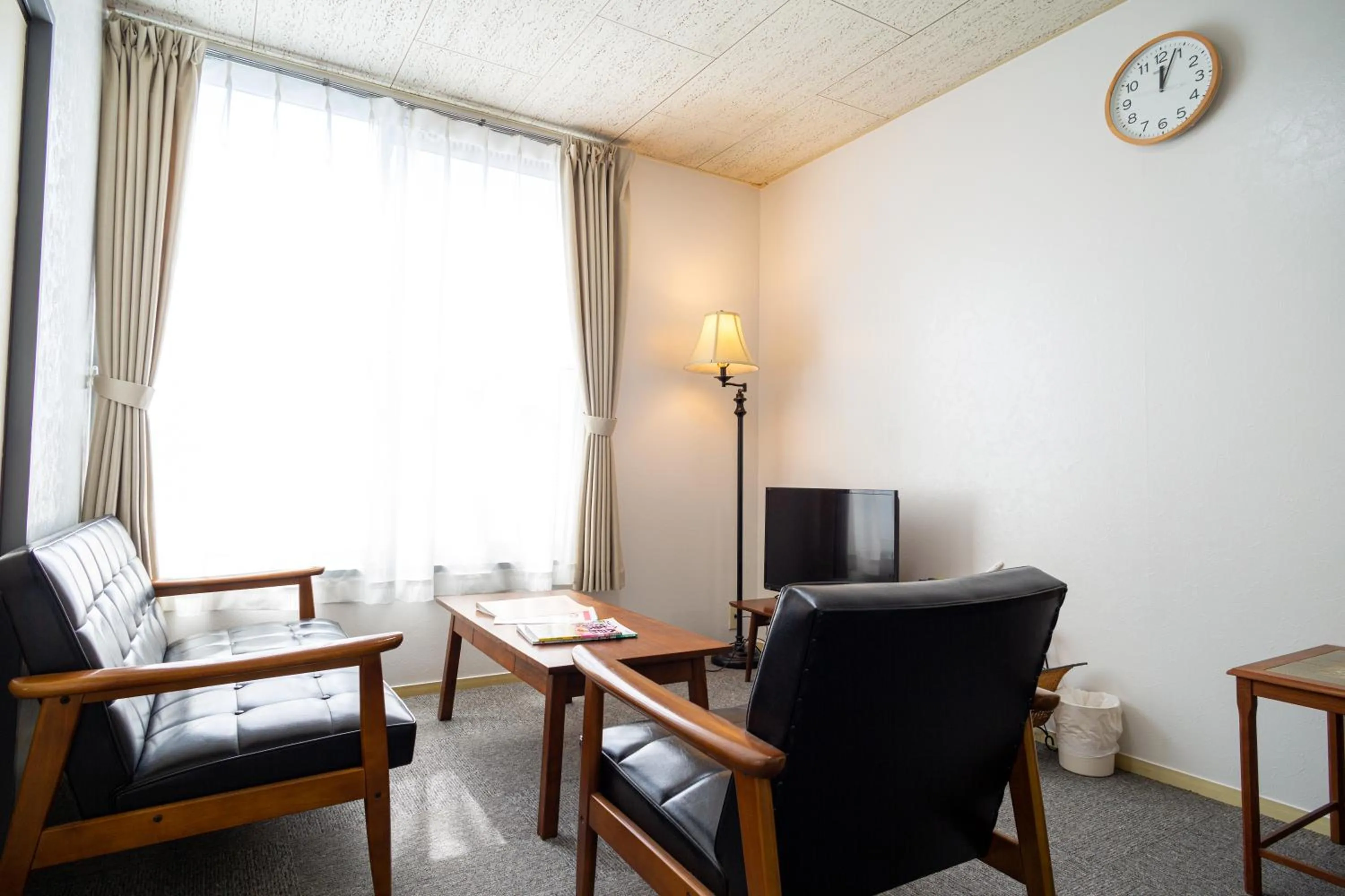 Living room in Enoshima Apartment Hotel