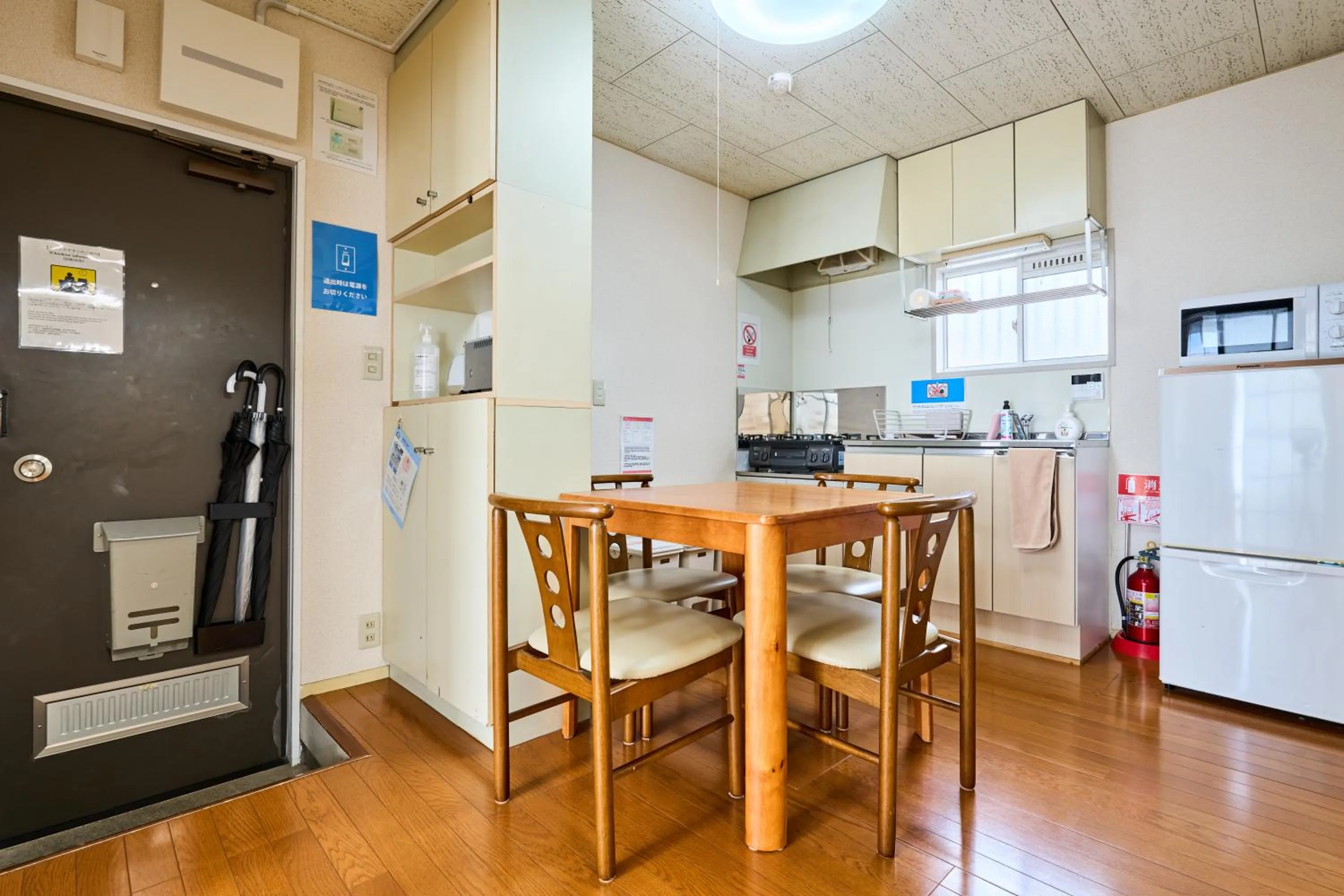 Kitchen or kitchenette in Enoshima Apartment Hotel