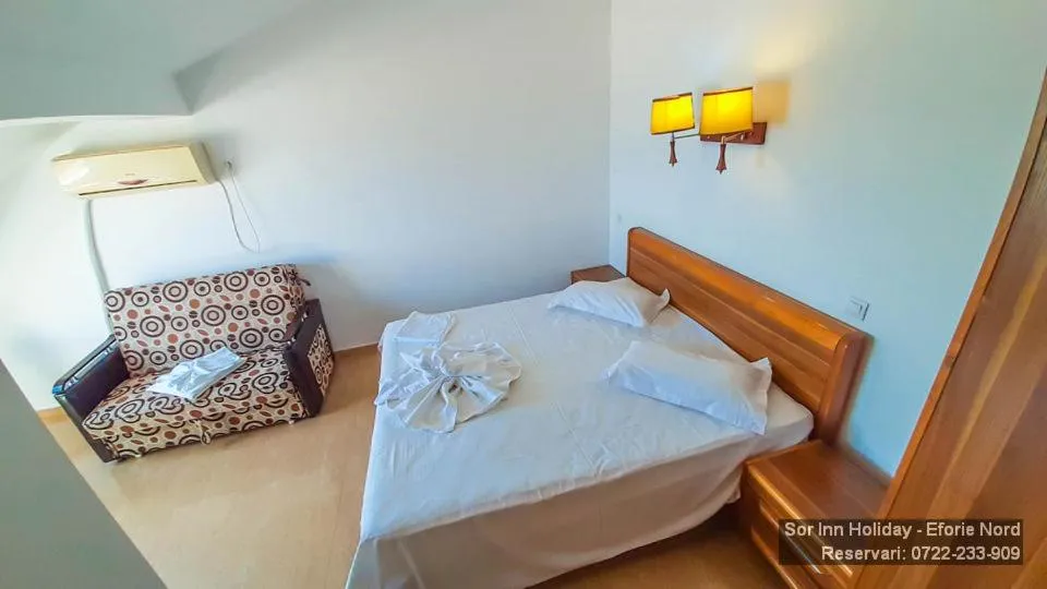 Bed in Sor Inn Holiday