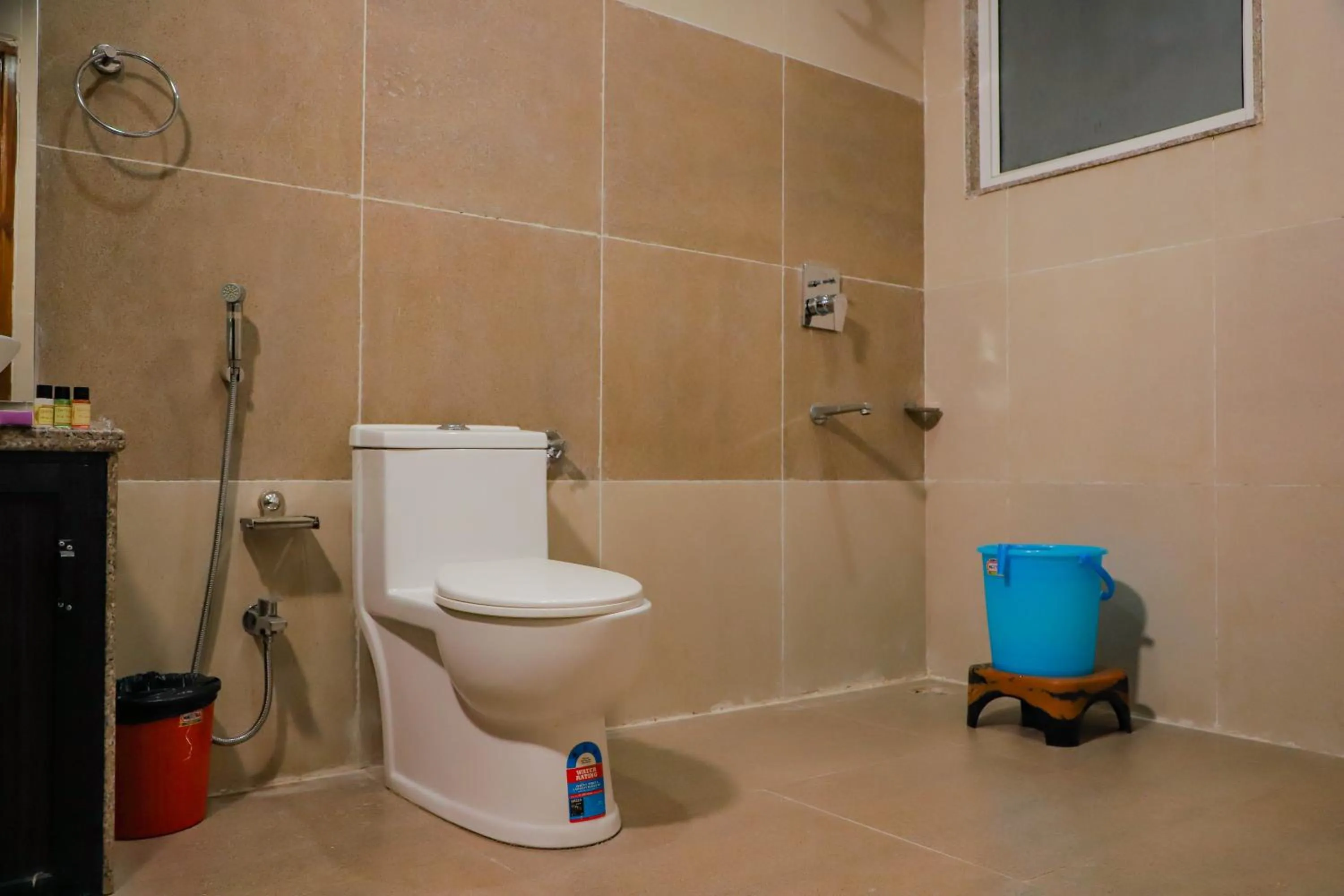 Bathroom in Komal Inn