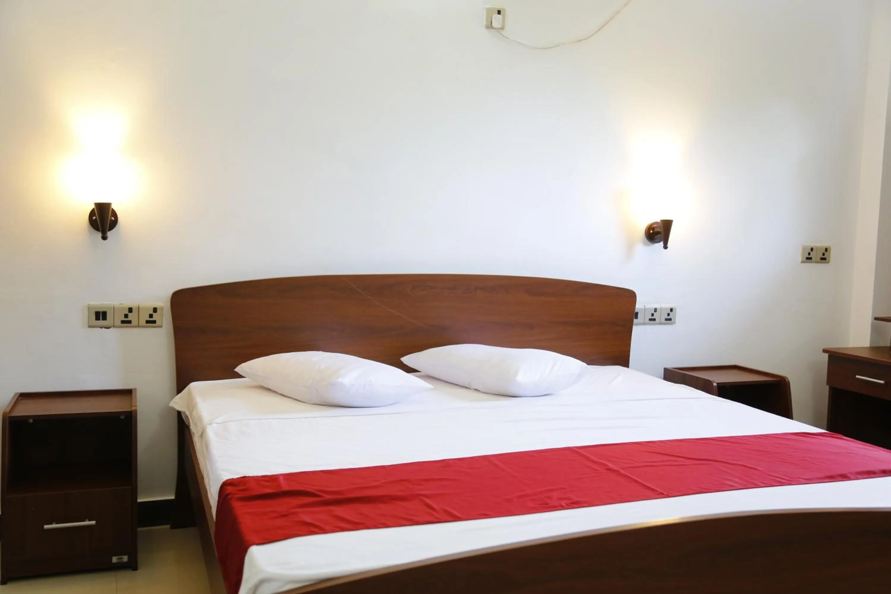 Bed in Ananthi HOTELS