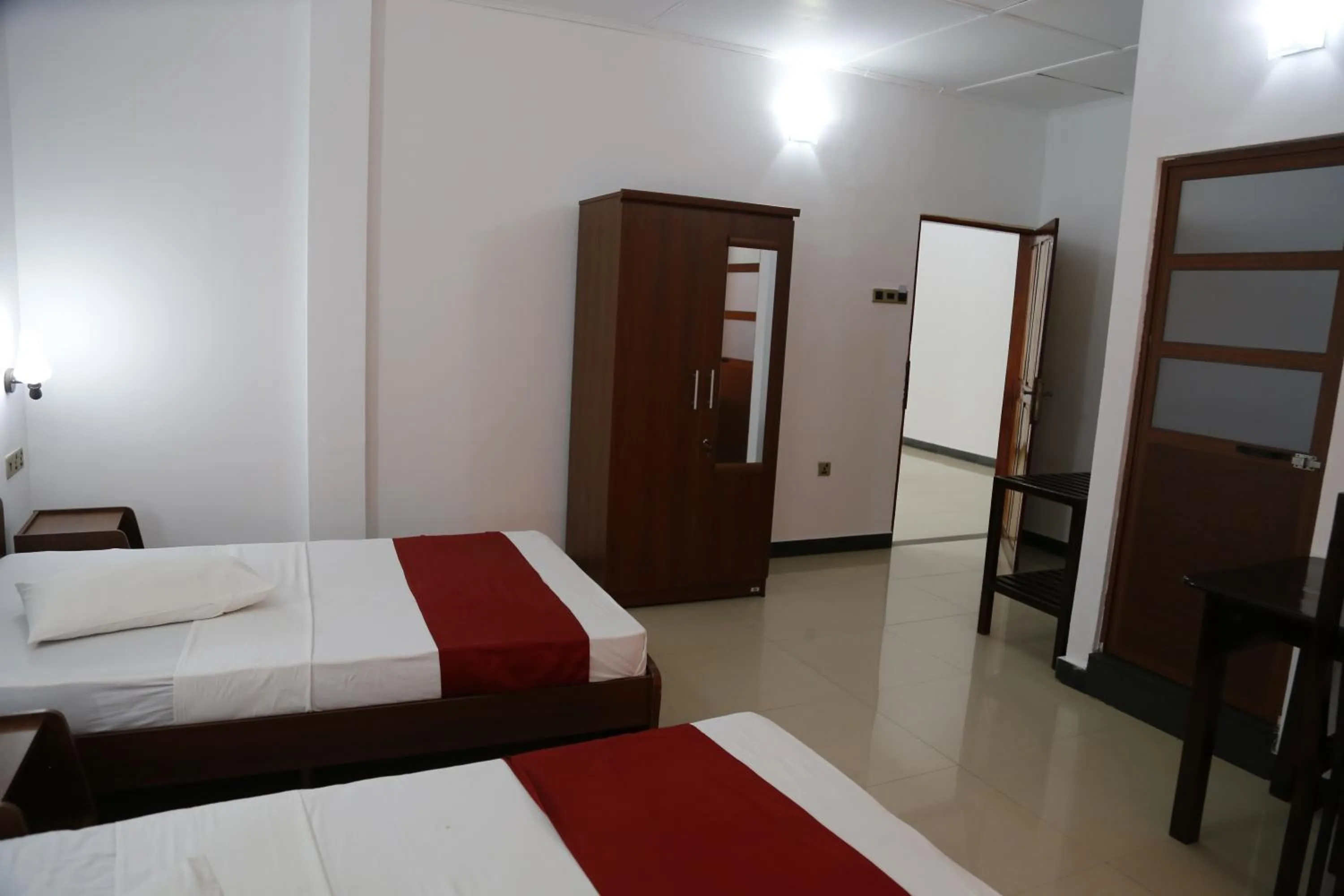 Bed in Ananthi HOTELS