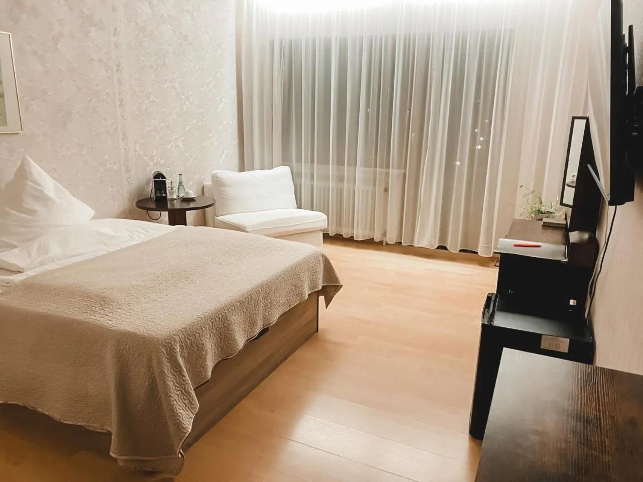 Bed in Hotel Harzer am Kurpark