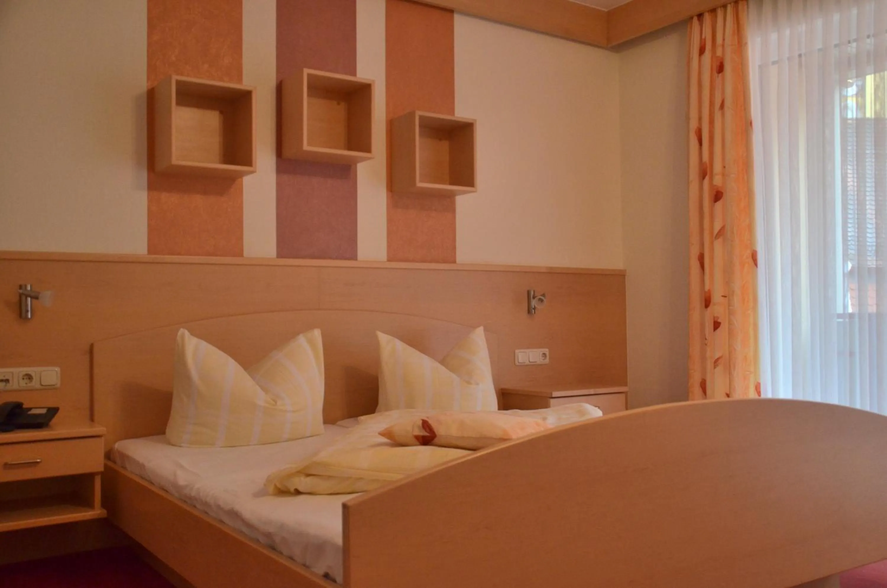 Bed in Hotel Königsteiner Hof