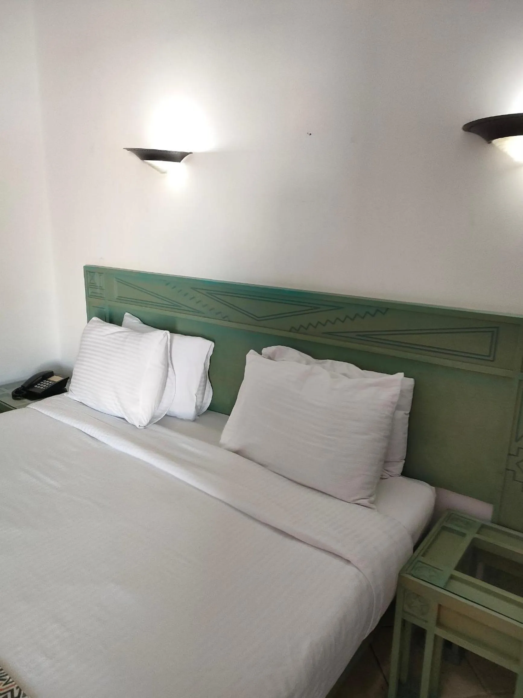 Bed in Green Leaves Hotel