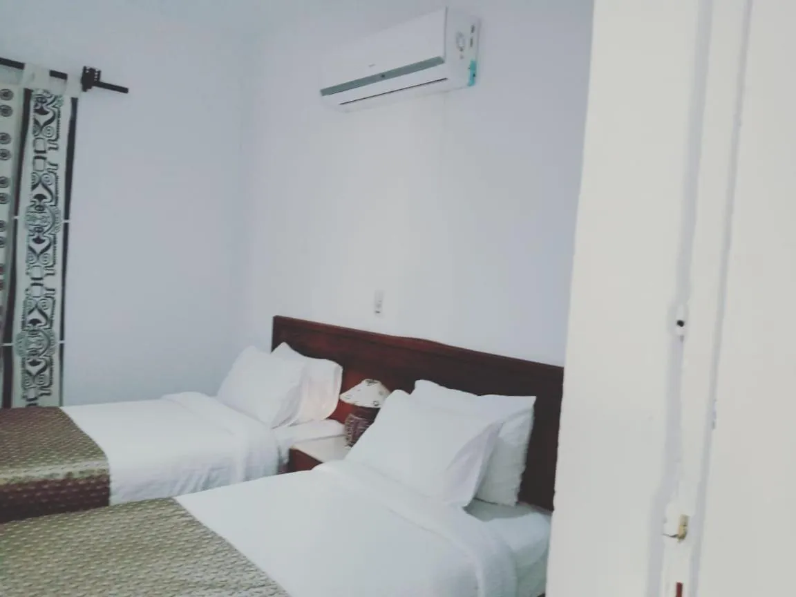 Bed in Green Leaves Hotel