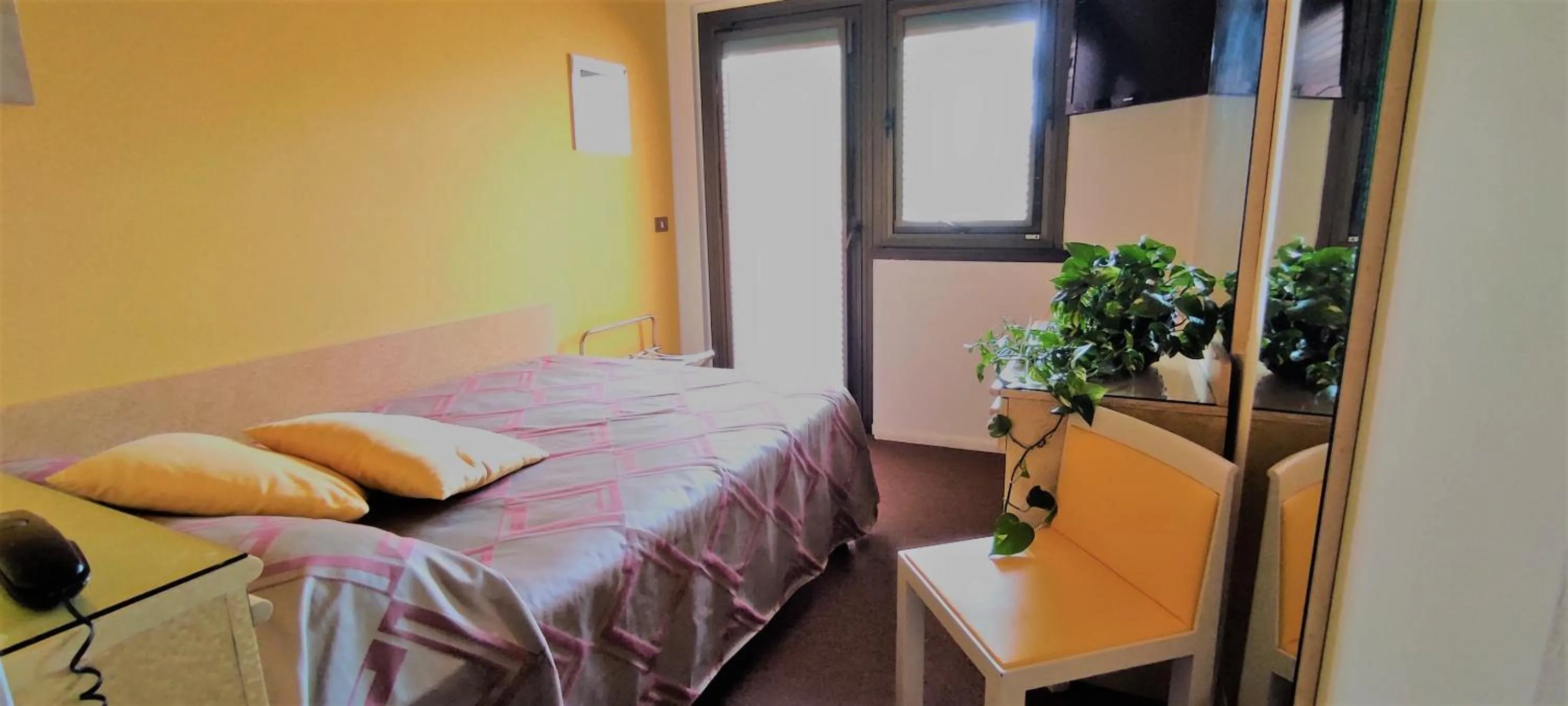 Bed in Hotel Antares