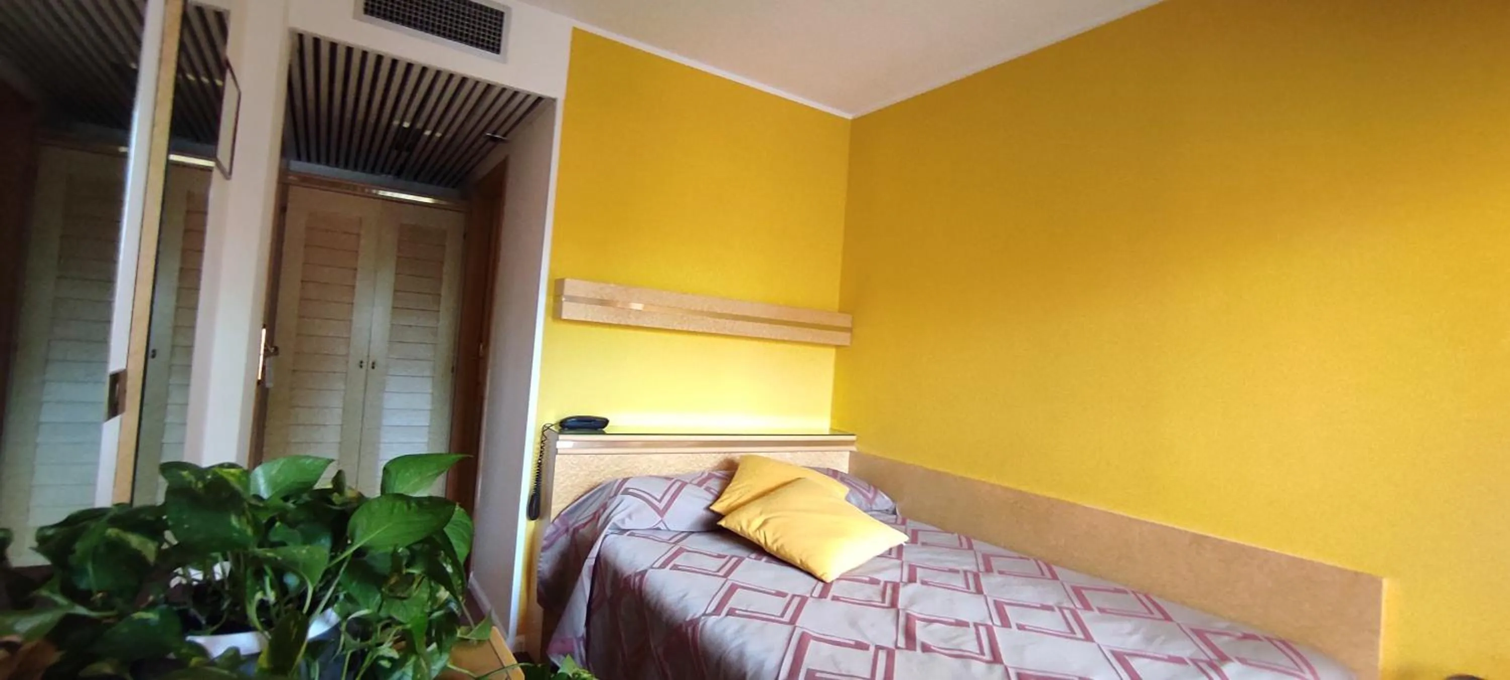 Bed in Hotel Antares