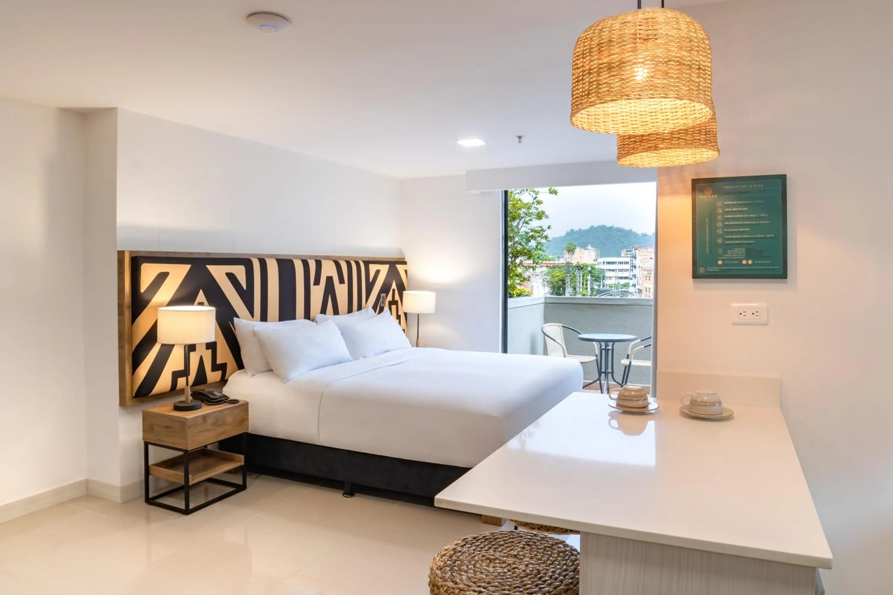 Bed in Origen Local Suites