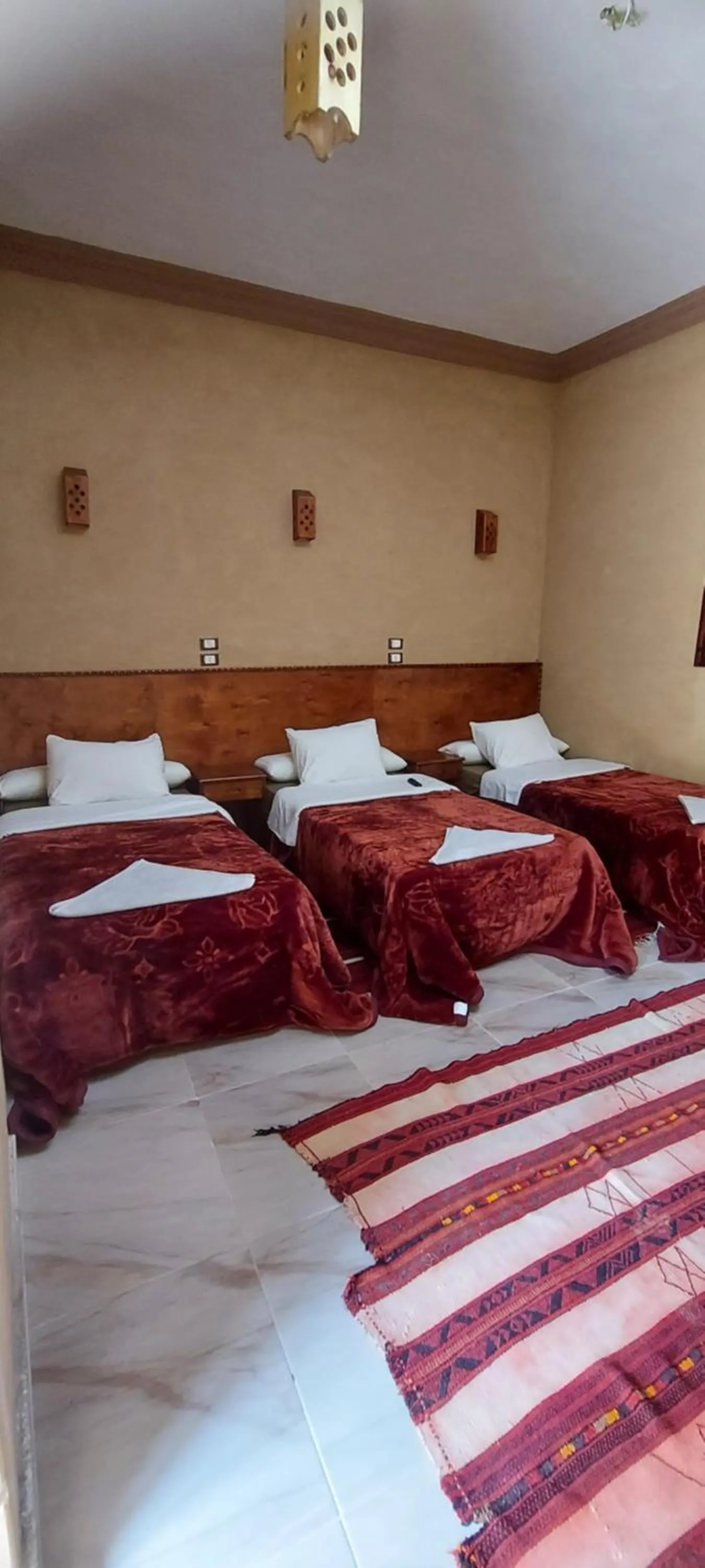 Bed in Nour El Waha Hotel