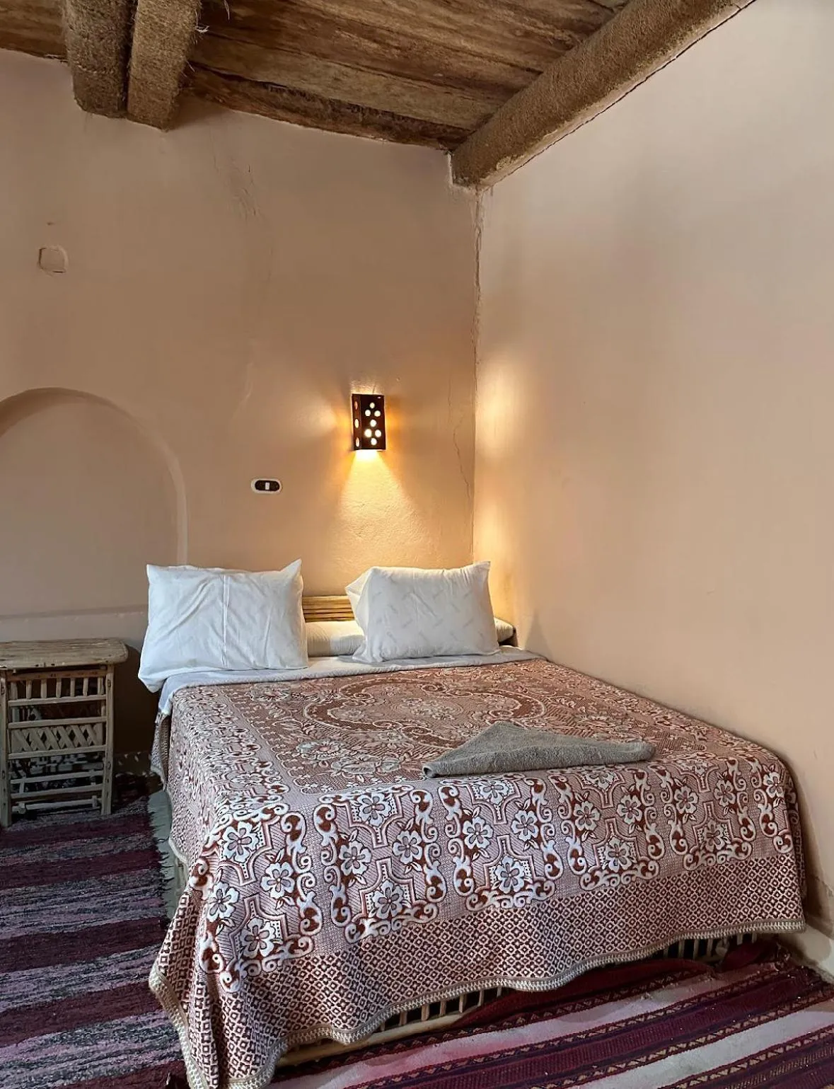 Bed in Nour El Waha Hotel