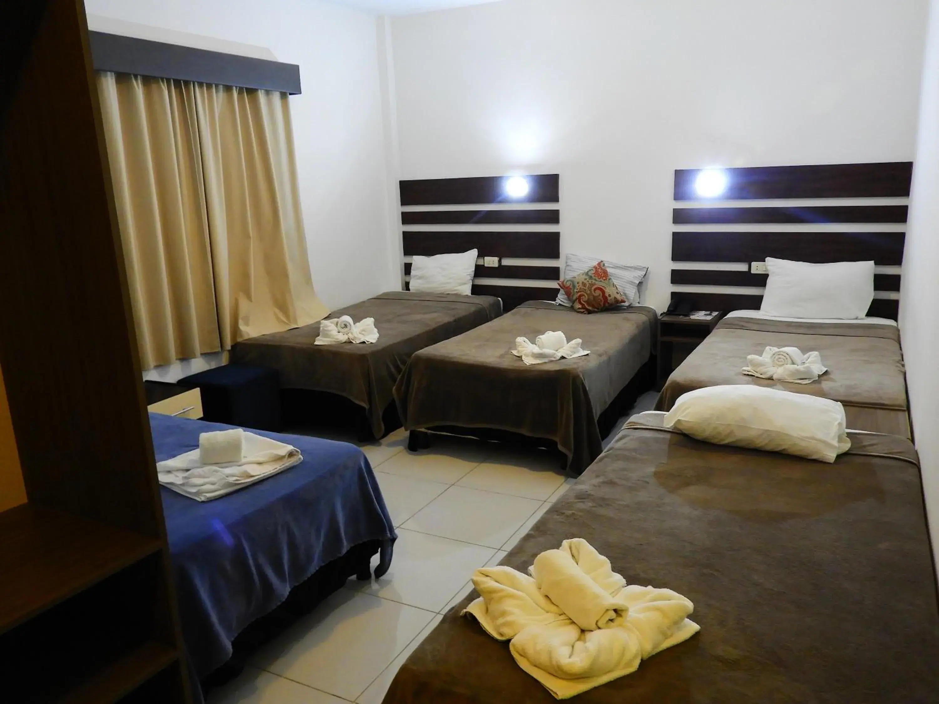 Quadruple Room in Hotel Puesta del Sol by Nobile Quadruple Room in Hotel Puesta del Sol by Nobile