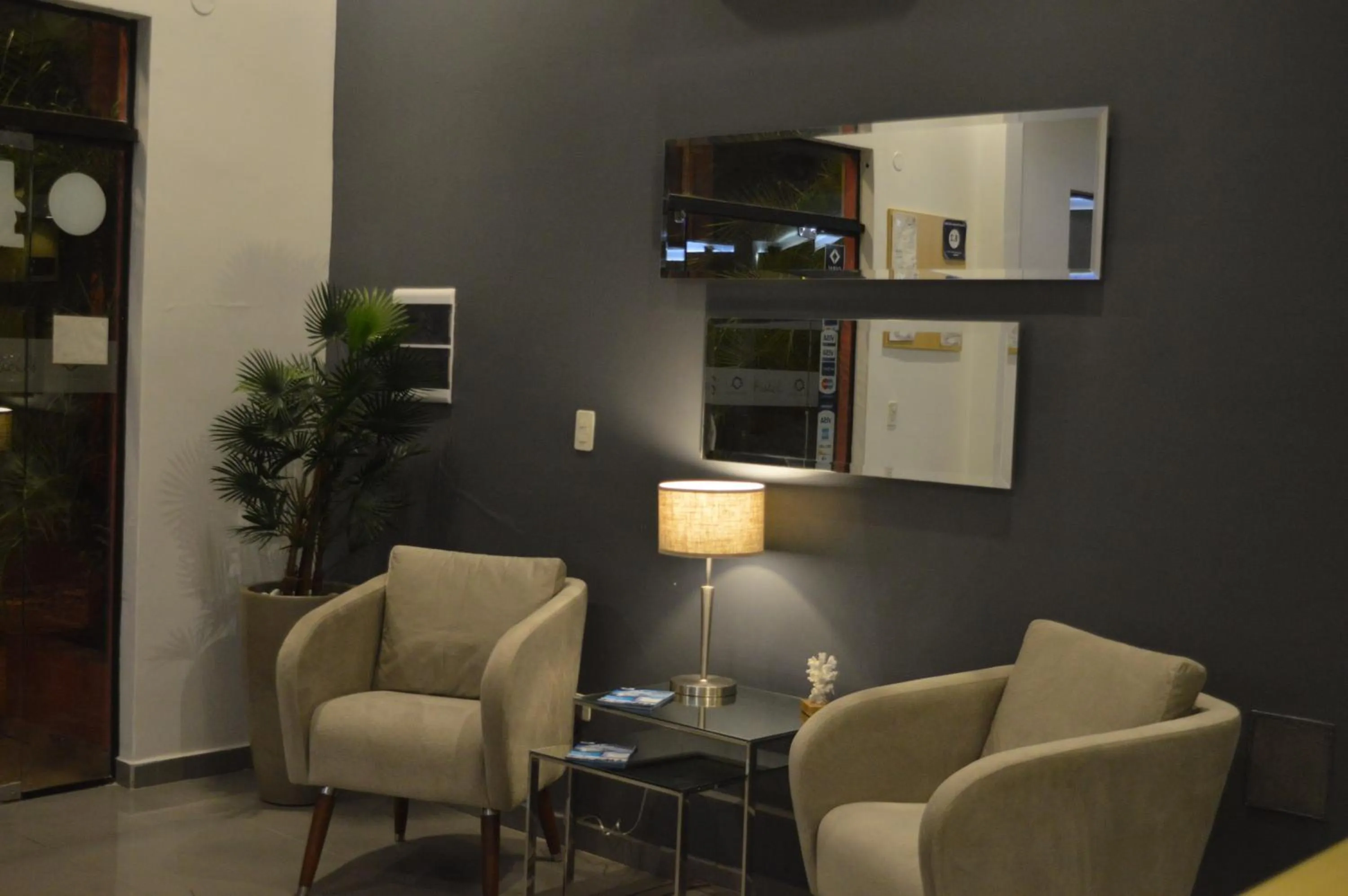 Communal lounge/ TV room in Hotel Puesta del Sol by Nobile