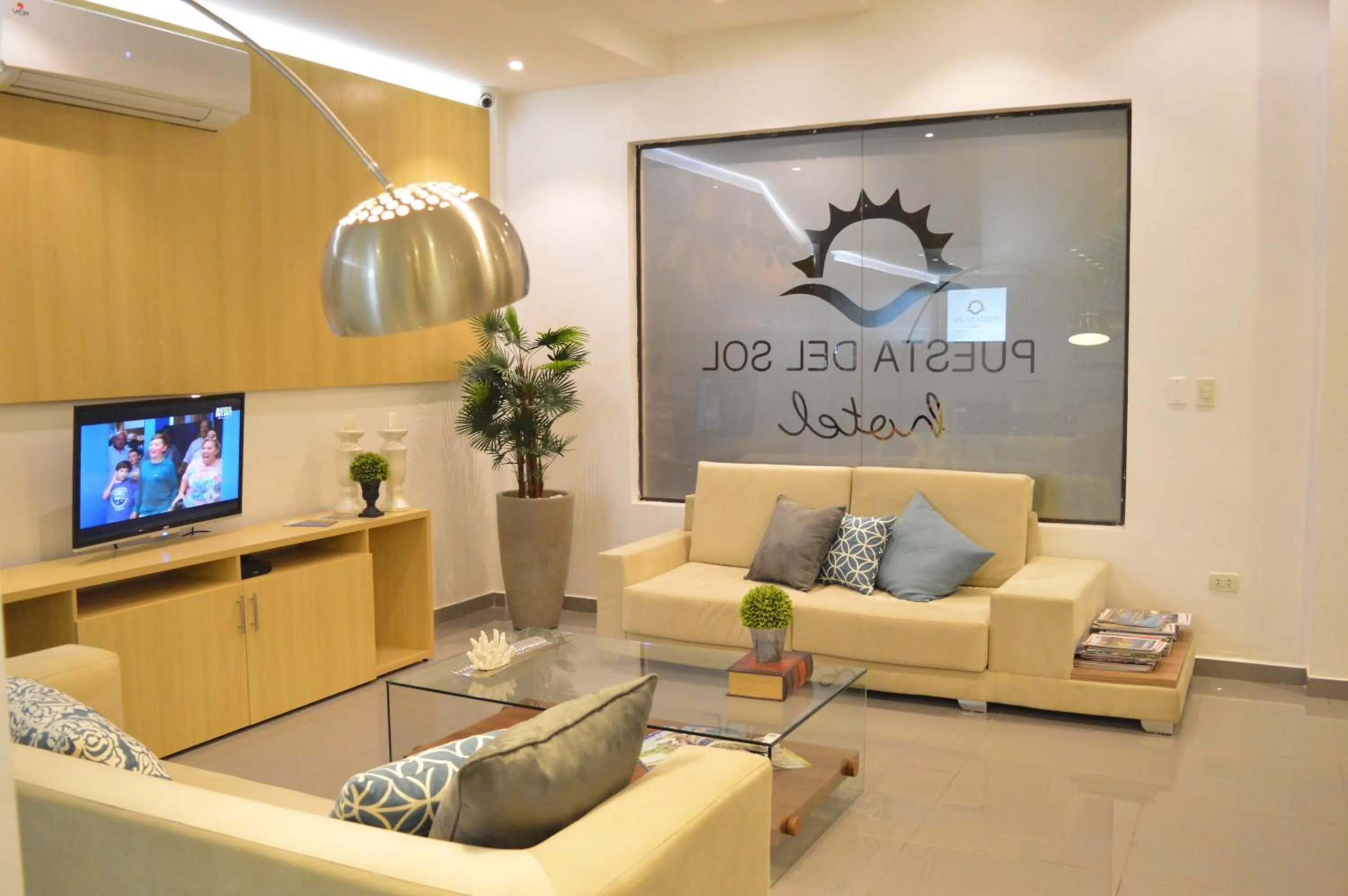 Communal lounge/ TV room in Hotel Puesta del Sol by Nobile