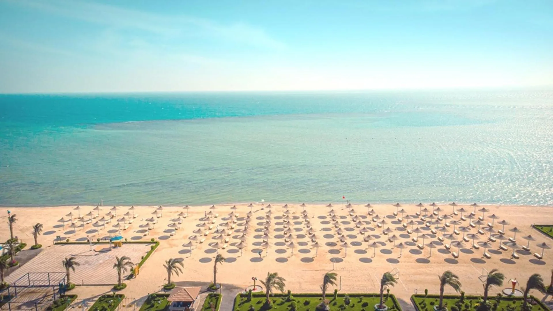 Beach in Hawaii Paradise Aqua Park Resort - Families and Couples Only