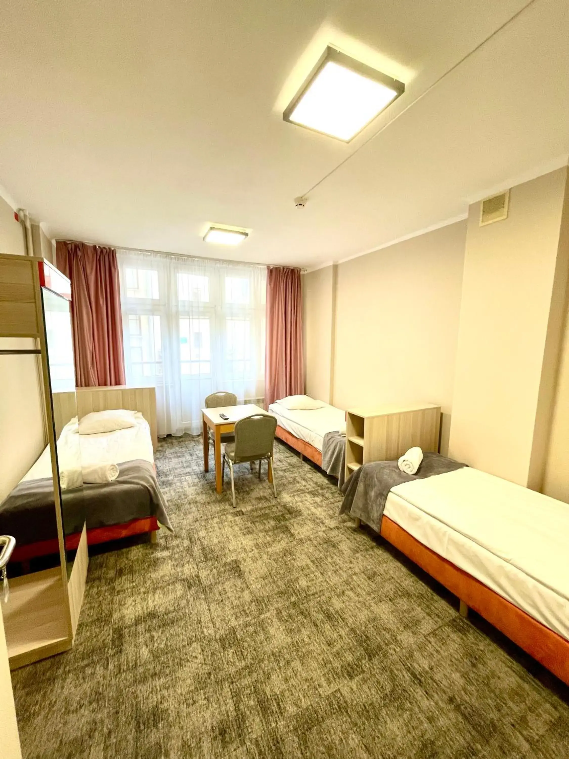 Triple Room with Shared Bathroom in eMKa Hostel Triple Room with Shared Bathroom in eMKa Hostel