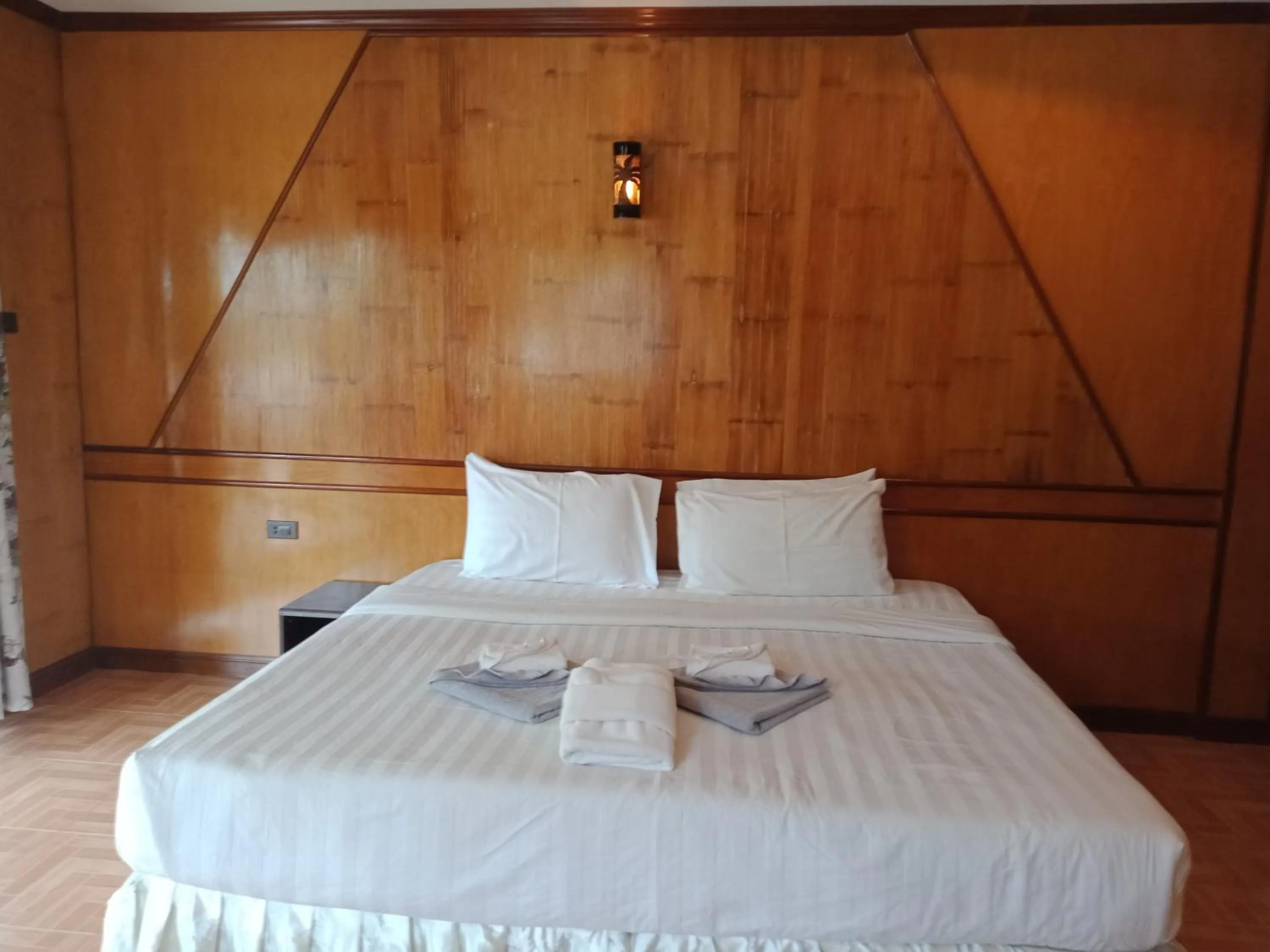 Bed in Bow Thong Beach Resort