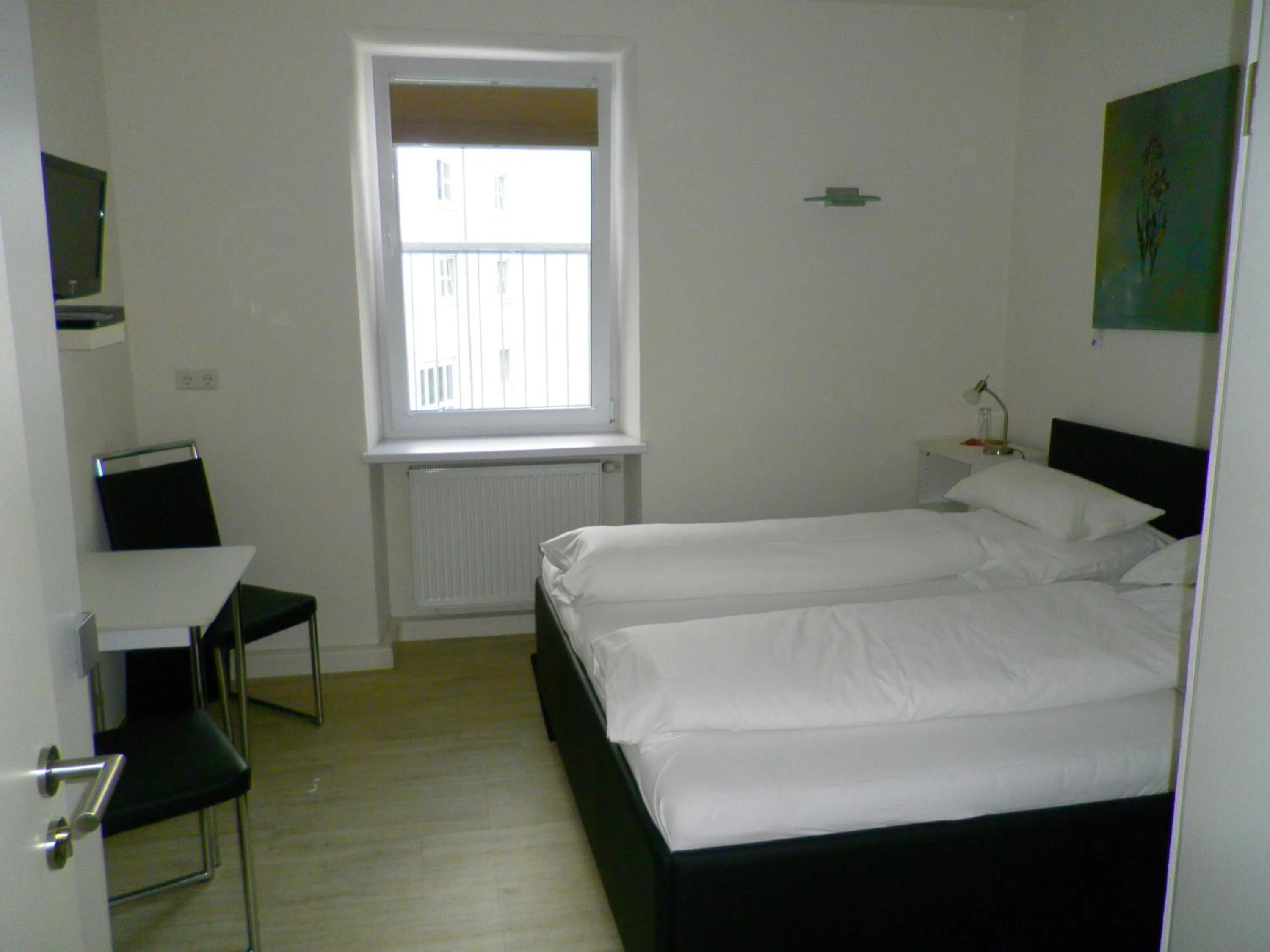 Photo of the whole room in Astra Hotel