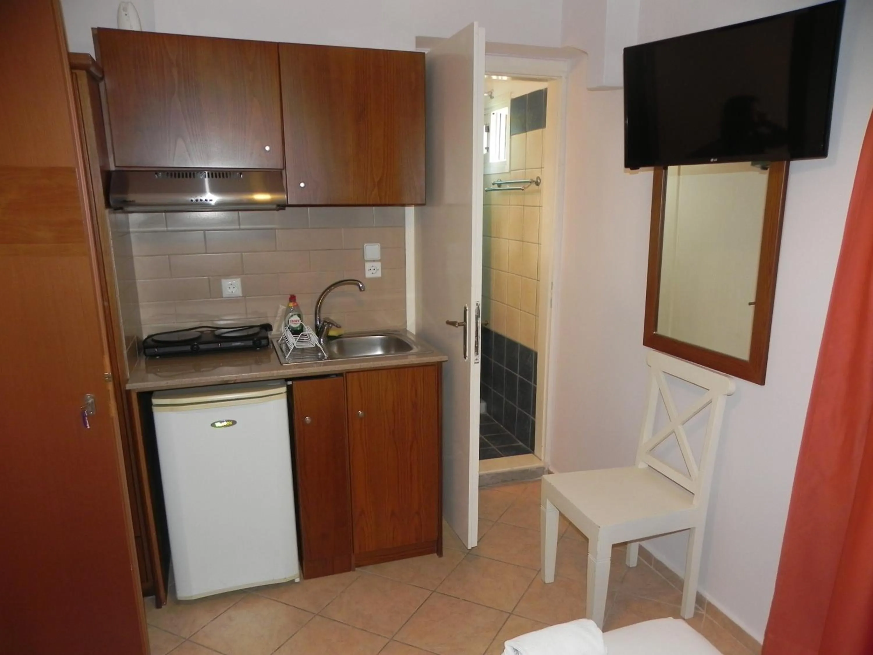 Kitchen or kitchenette in Pension Niki