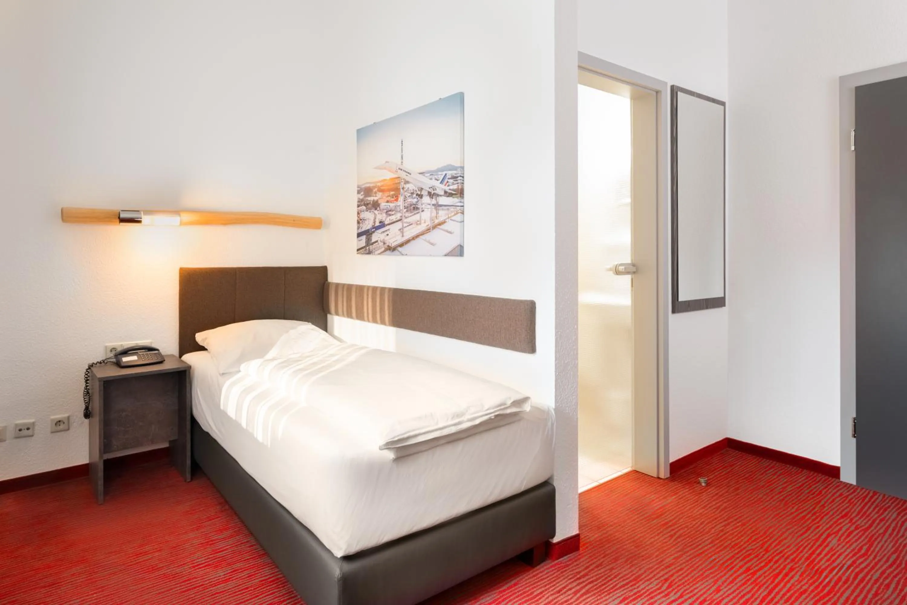 Photo of the whole room, Bed in Hotel Speyer am Technik Museum