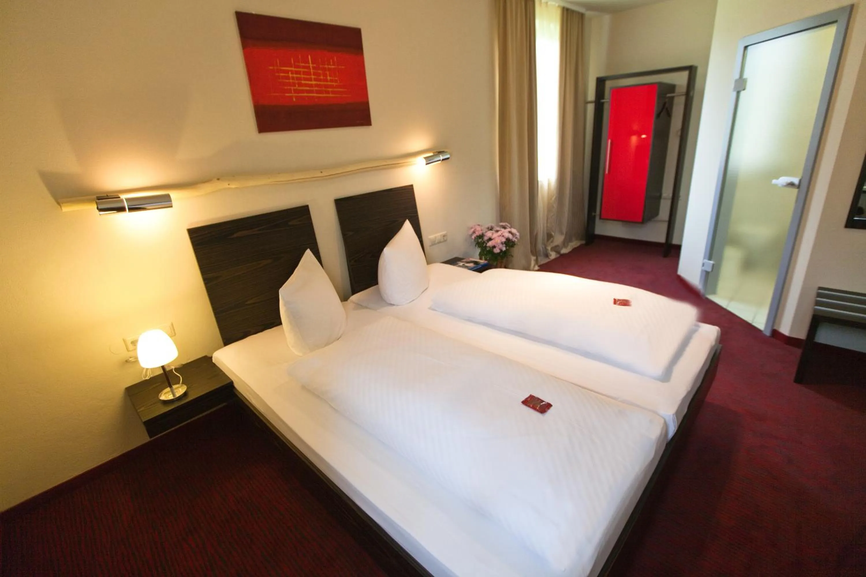 Photo of the whole room, Bed in Hotel Speyer am Technik Museum