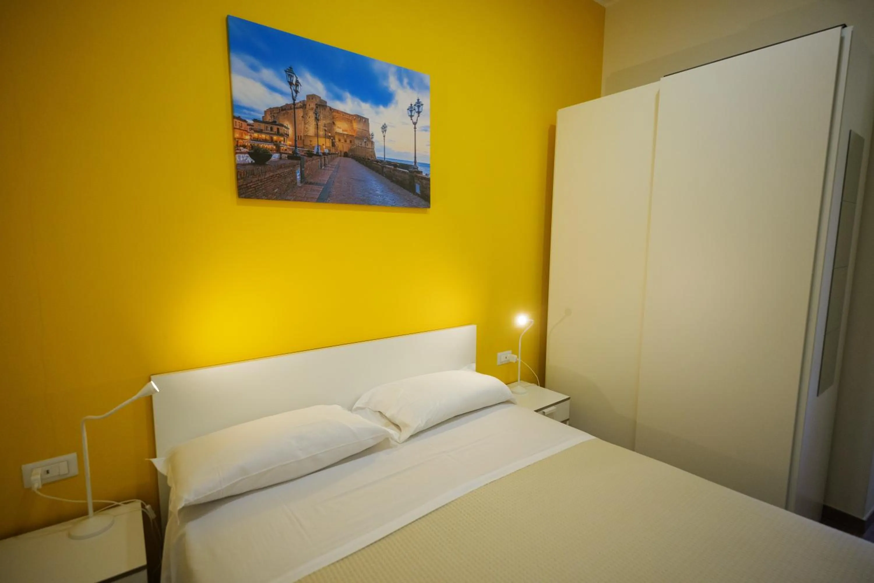 Bed in Terminal 1 Guest House