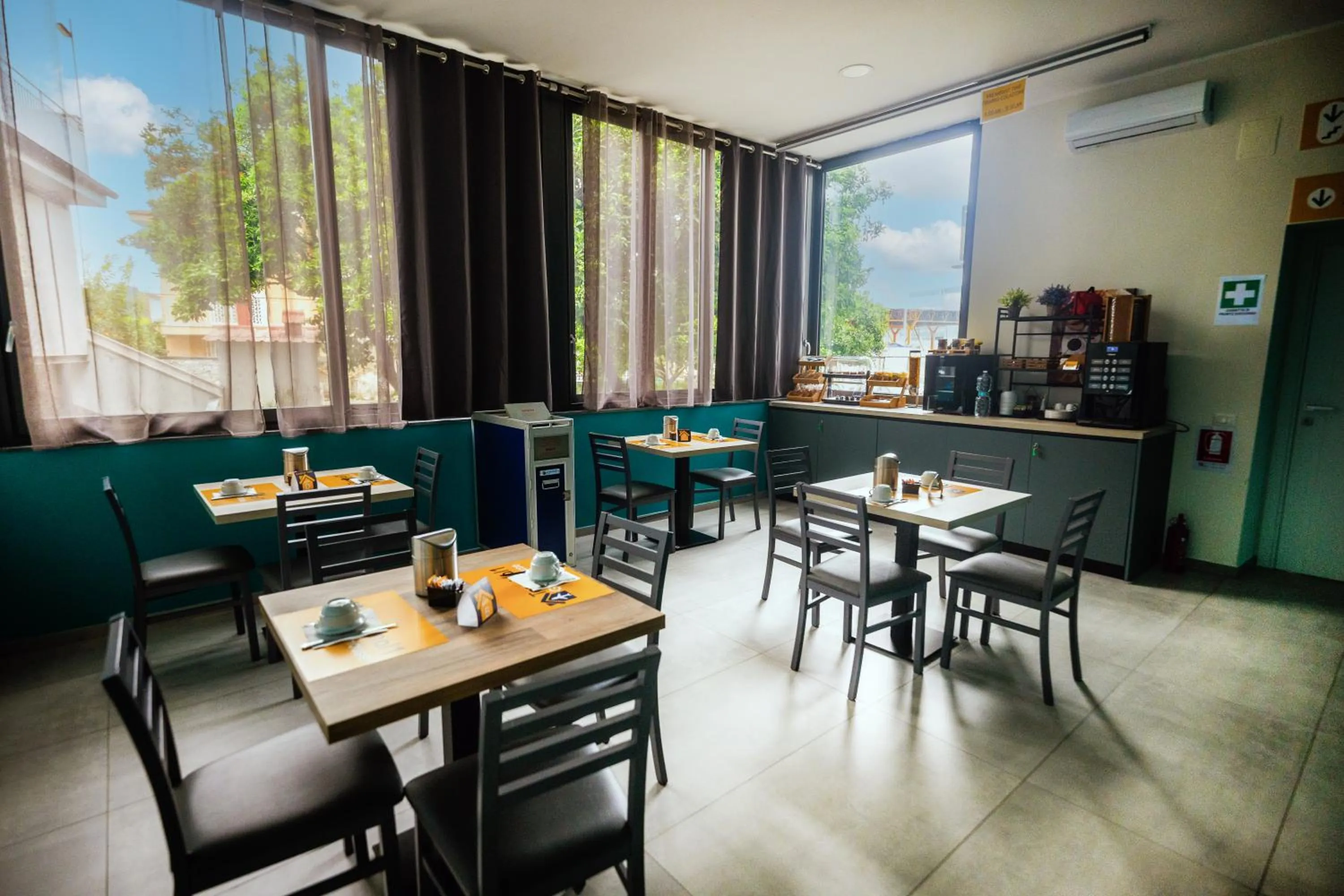 Communal lounge/ TV room in Terminal 1 Guest House