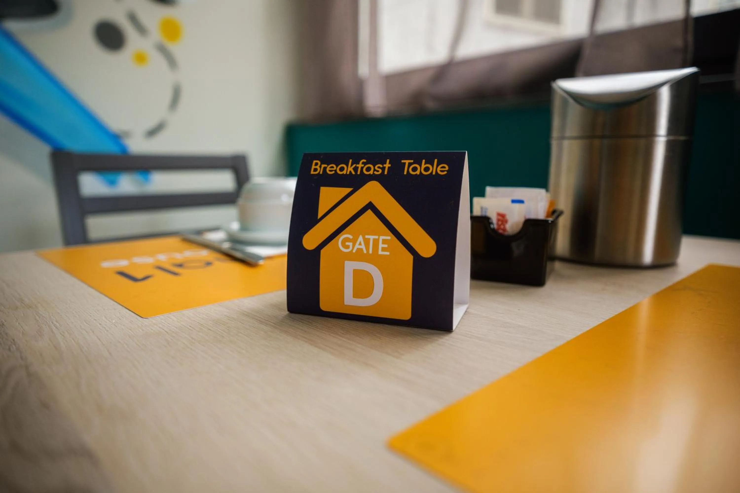 Communal lounge/ TV room in Terminal 1 Guest House