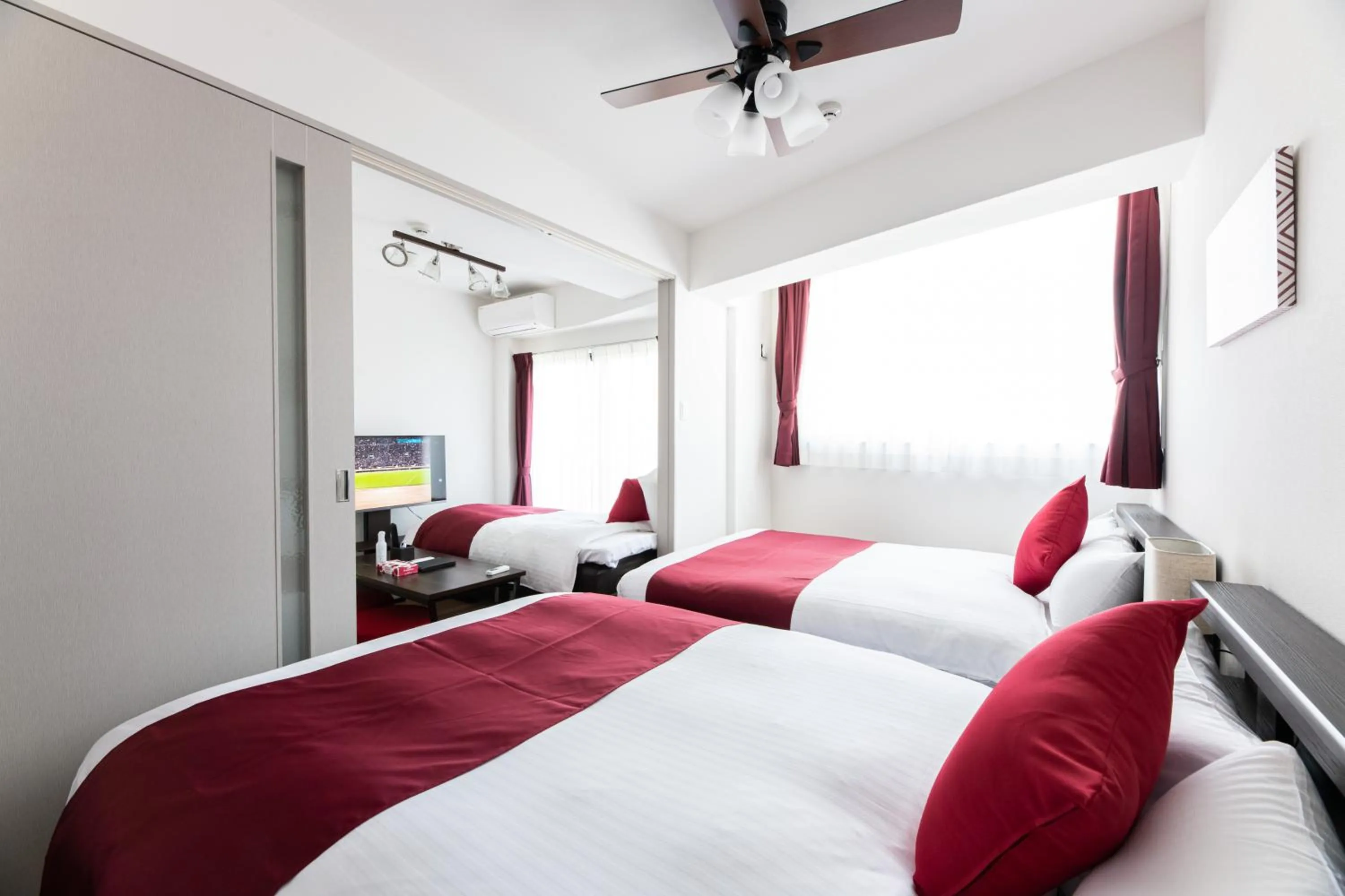 Bed in Grand Inn Canalside