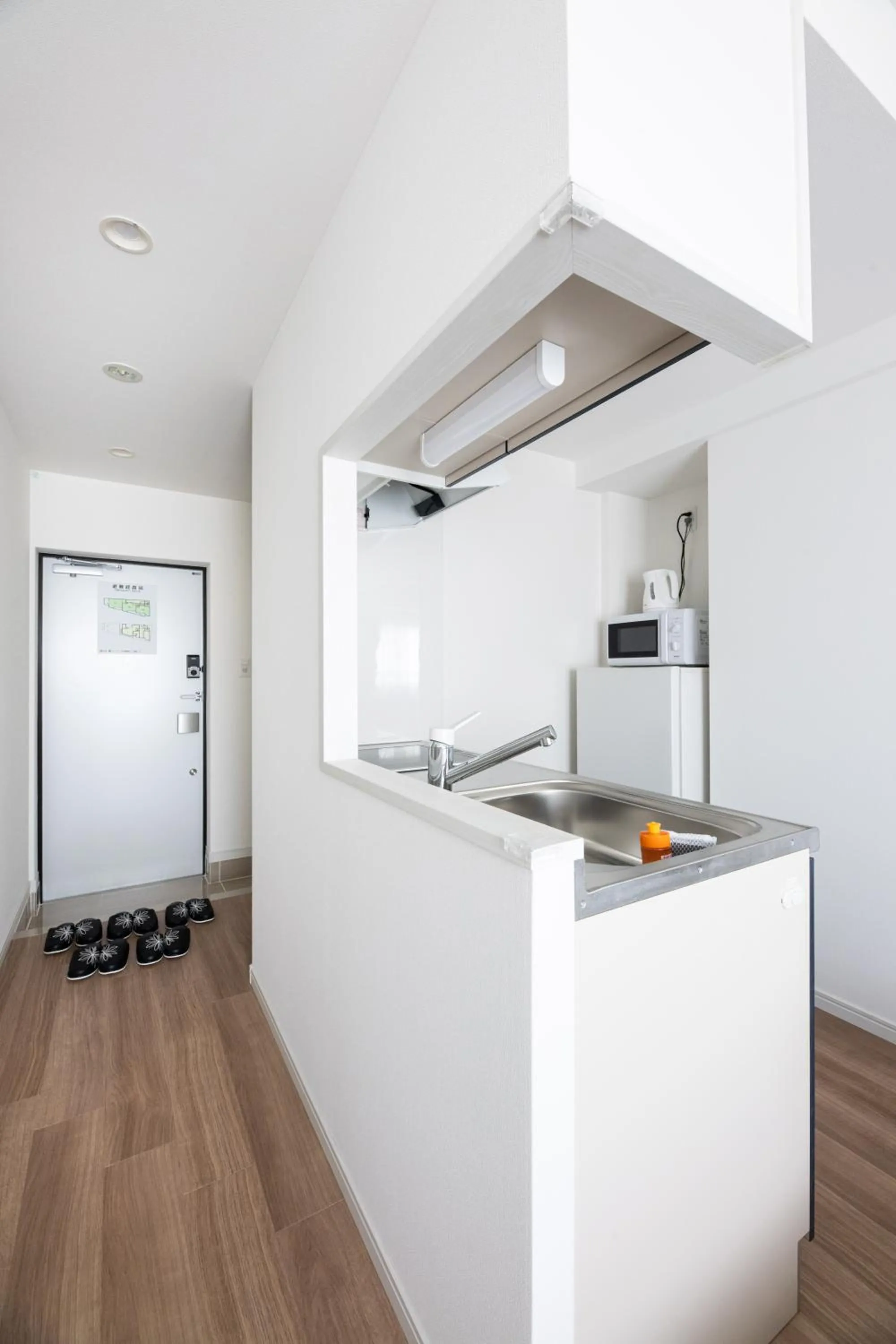 Kitchen or kitchenette in Grand Inn Canalside