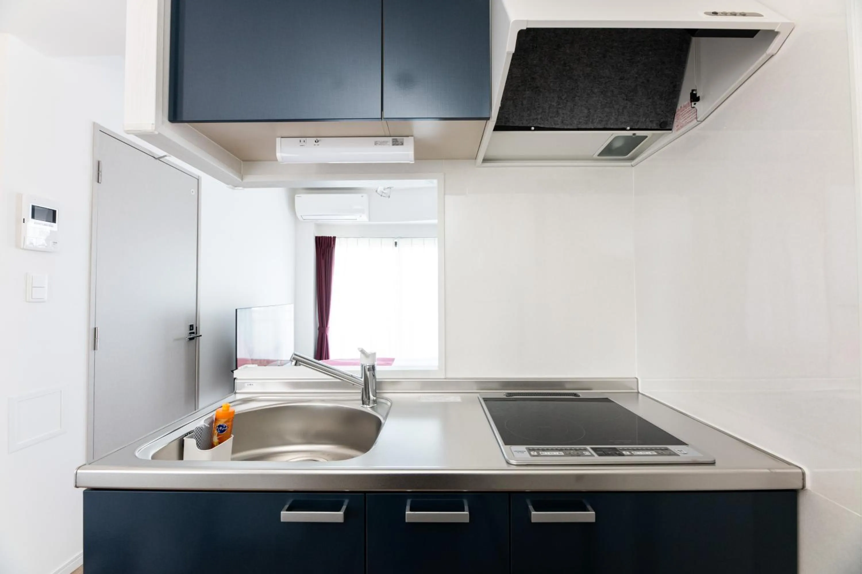 Kitchen or kitchenette in Grand Inn Canalside