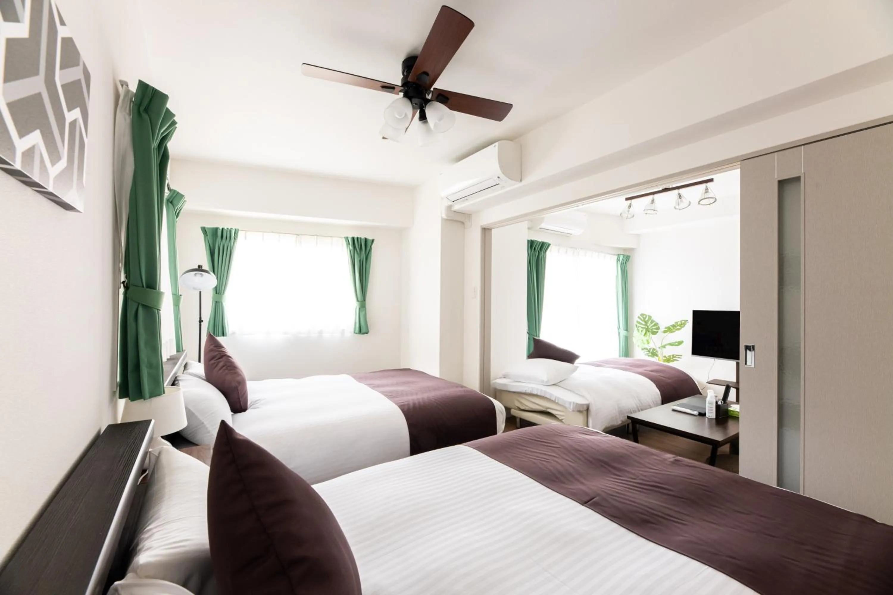 Photo of the whole room, Bed in Grand Inn Canalside