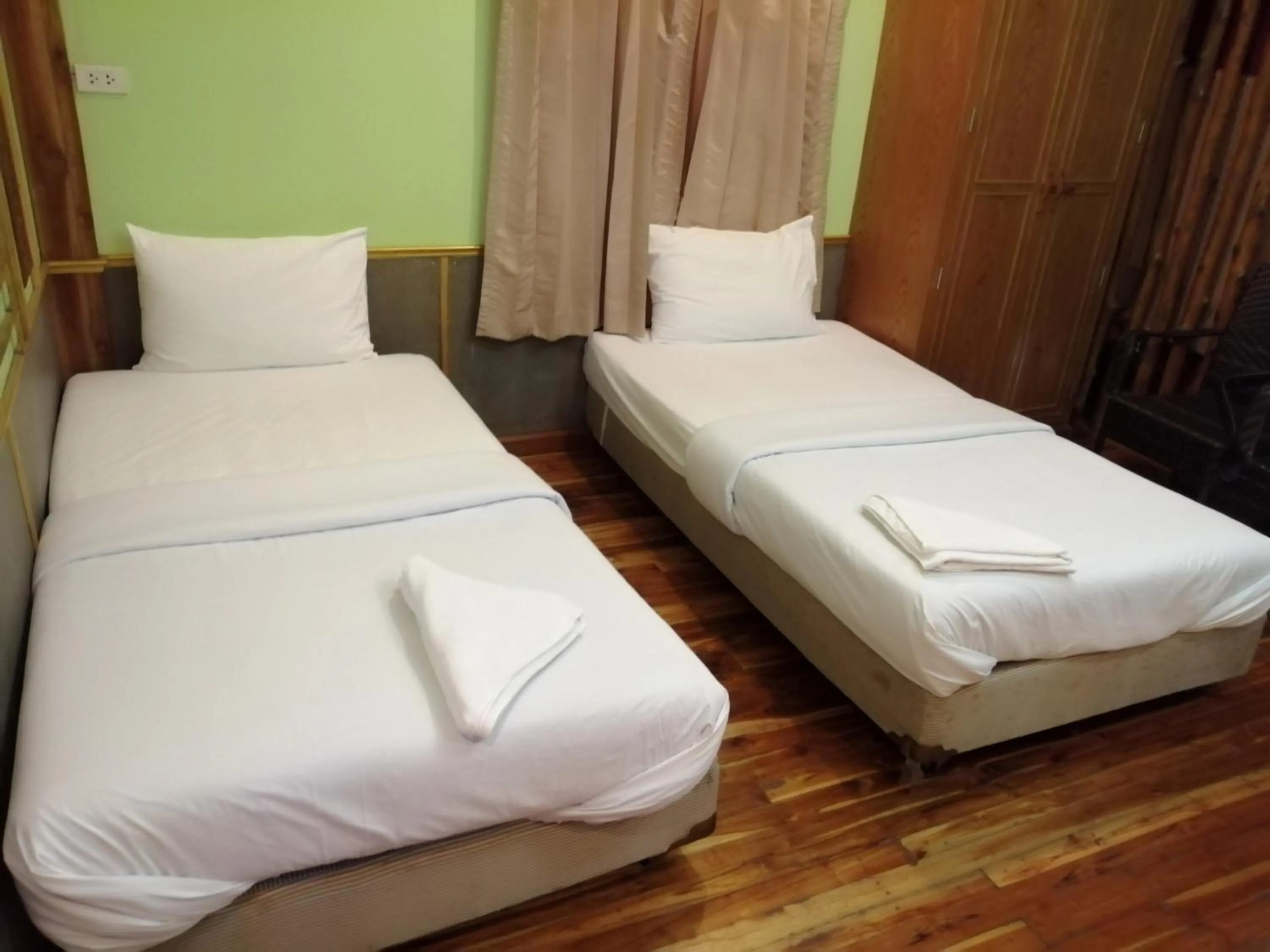 Bed in Nang Phraya Resort