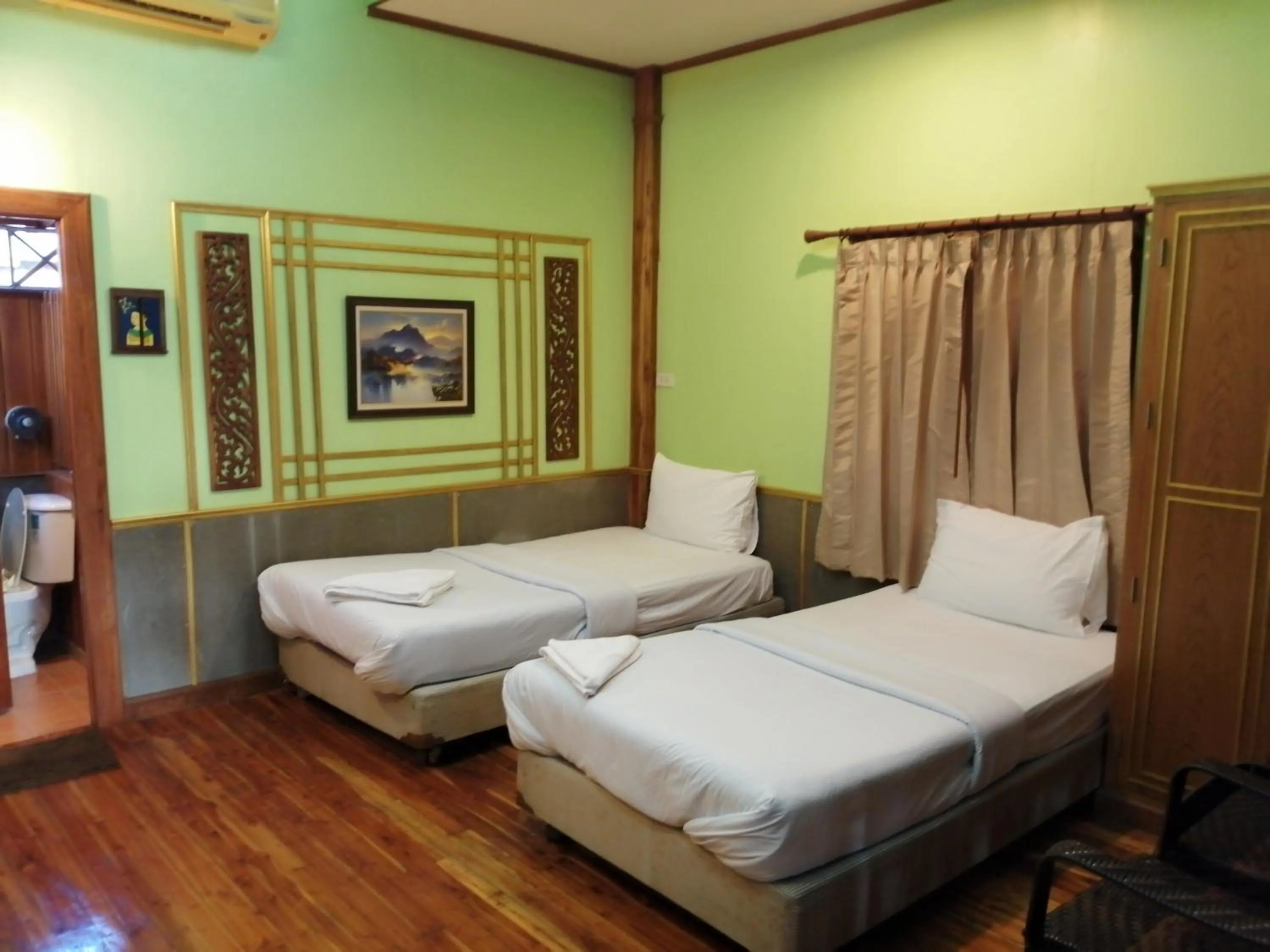 Bed in Nang Phraya Resort