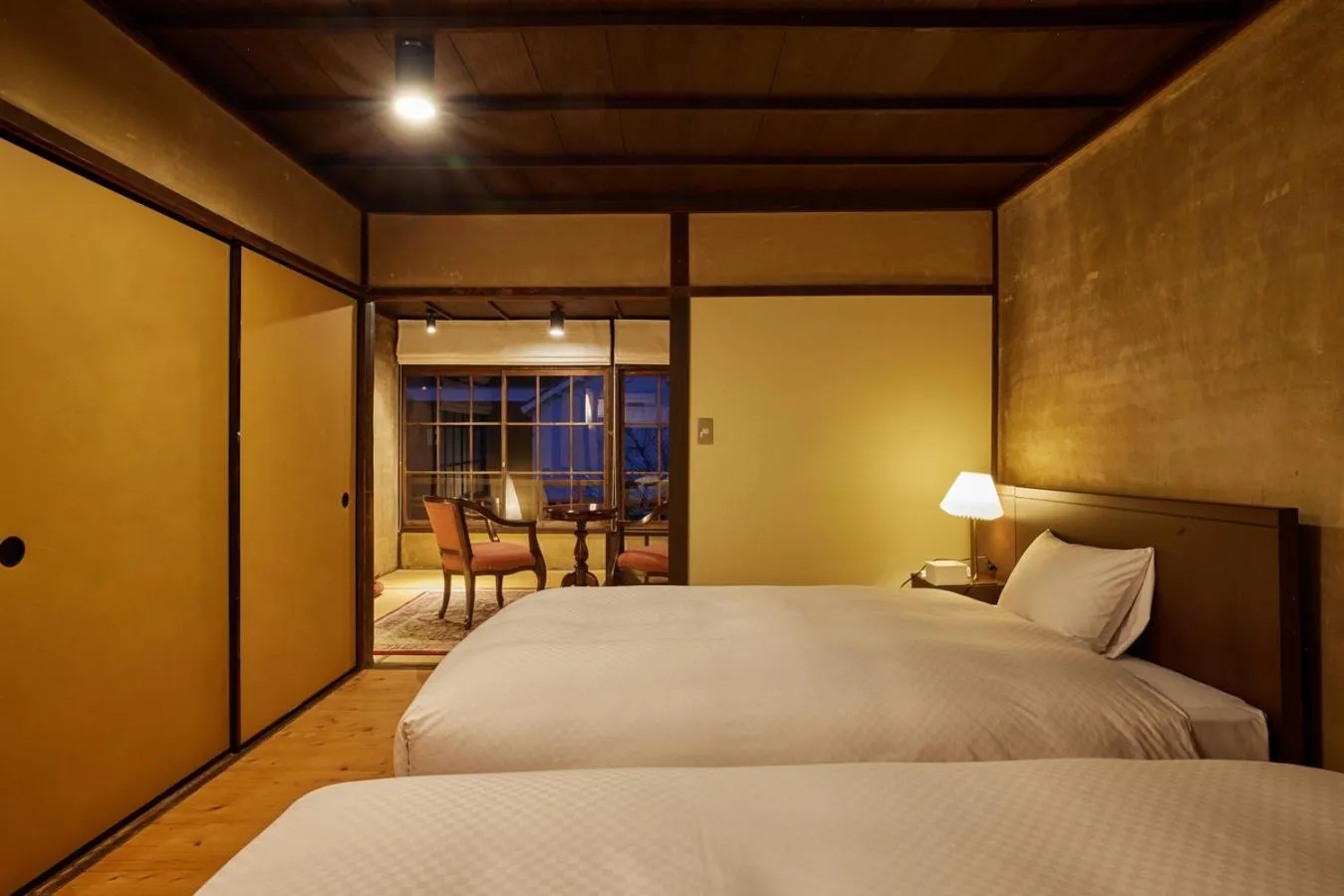 Bed in NIPPONIA HOTEL Ozu Castle Town