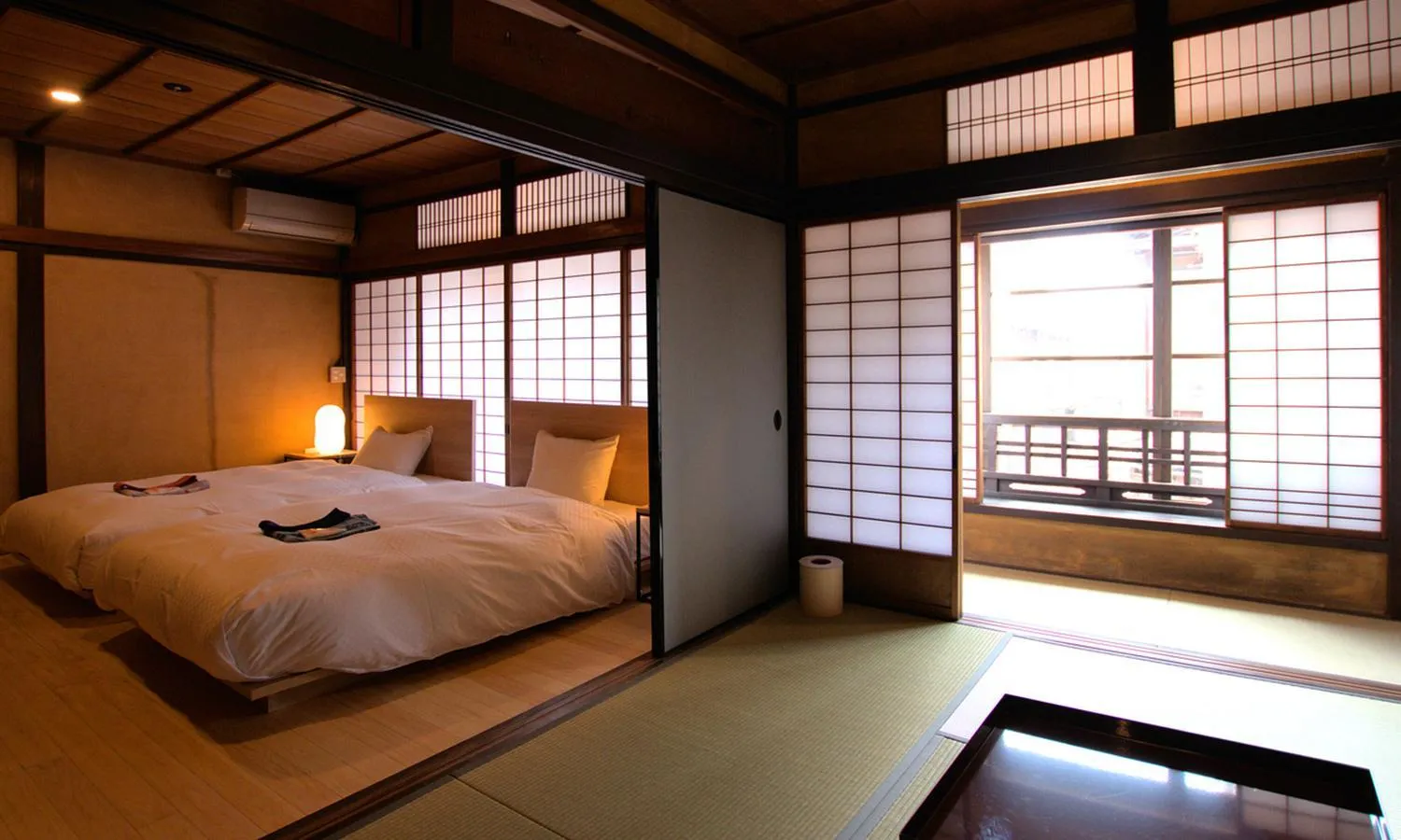 Bed in NIPPONIA HOTEL Ozu Castle Town