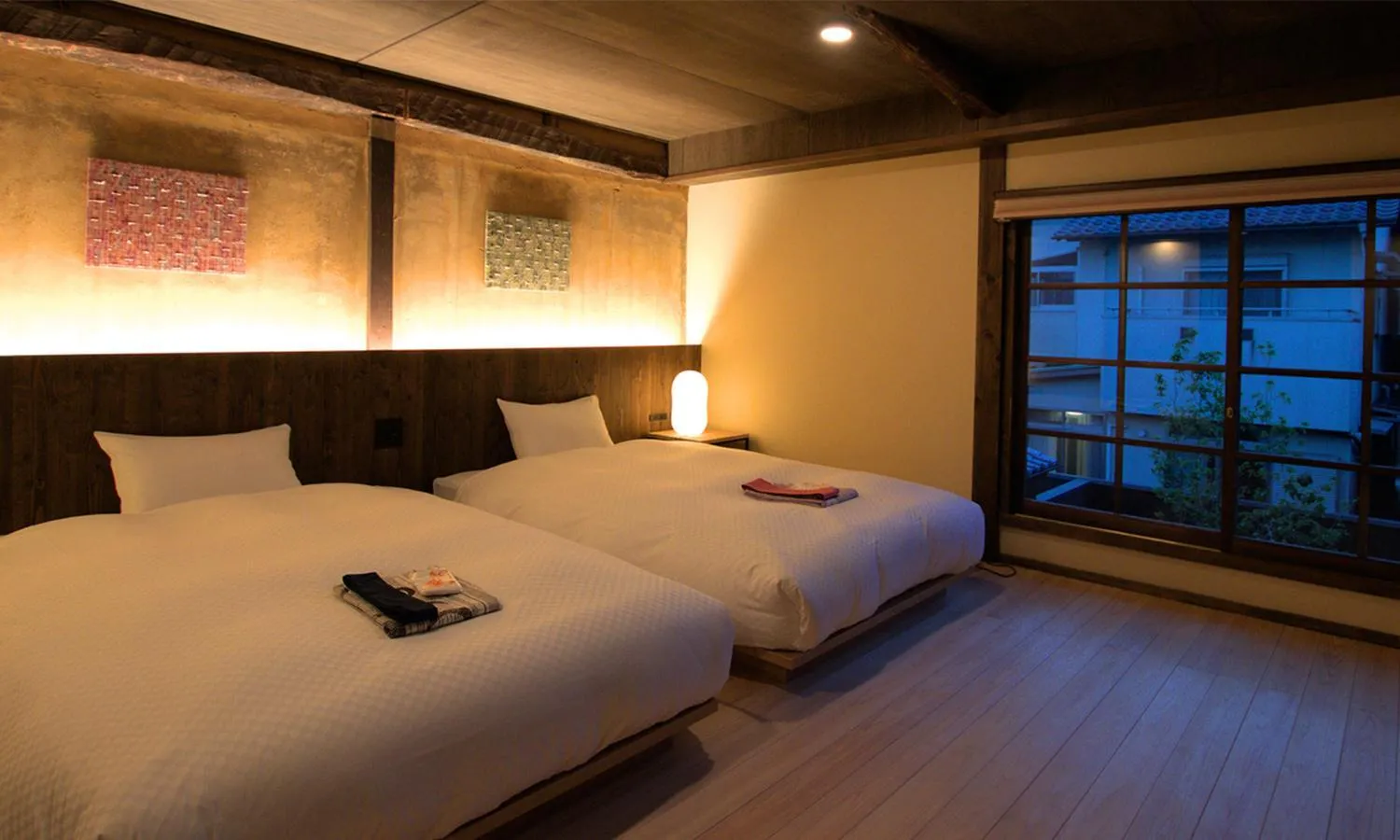 Bed in NIPPONIA HOTEL Ozu Castle Town