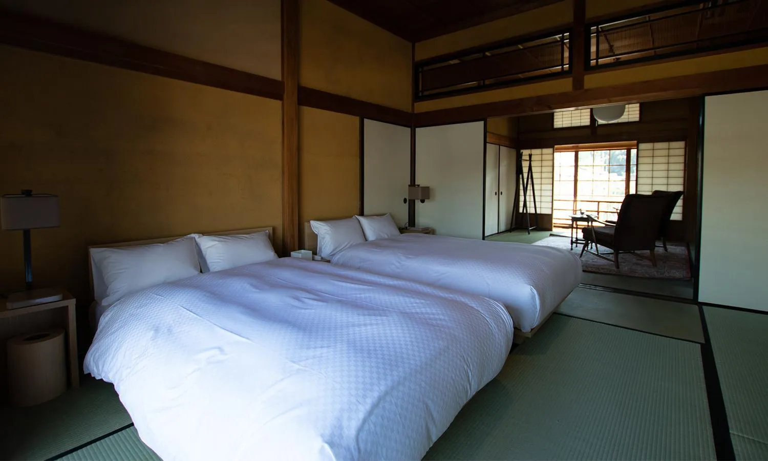 Bed in NIPPONIA HOTEL Ozu Castle Town