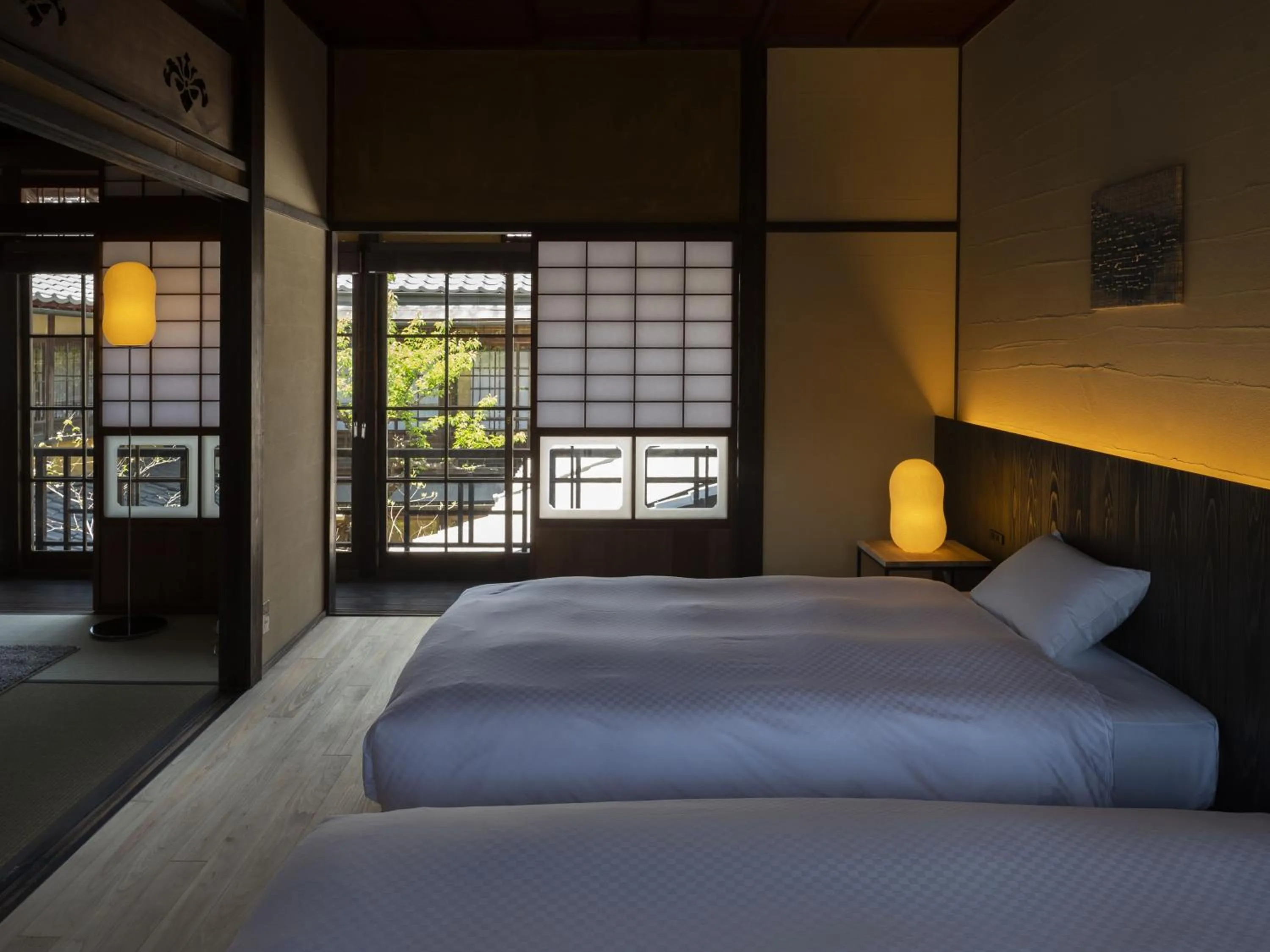 Bed in NIPPONIA HOTEL Ozu Castle Town