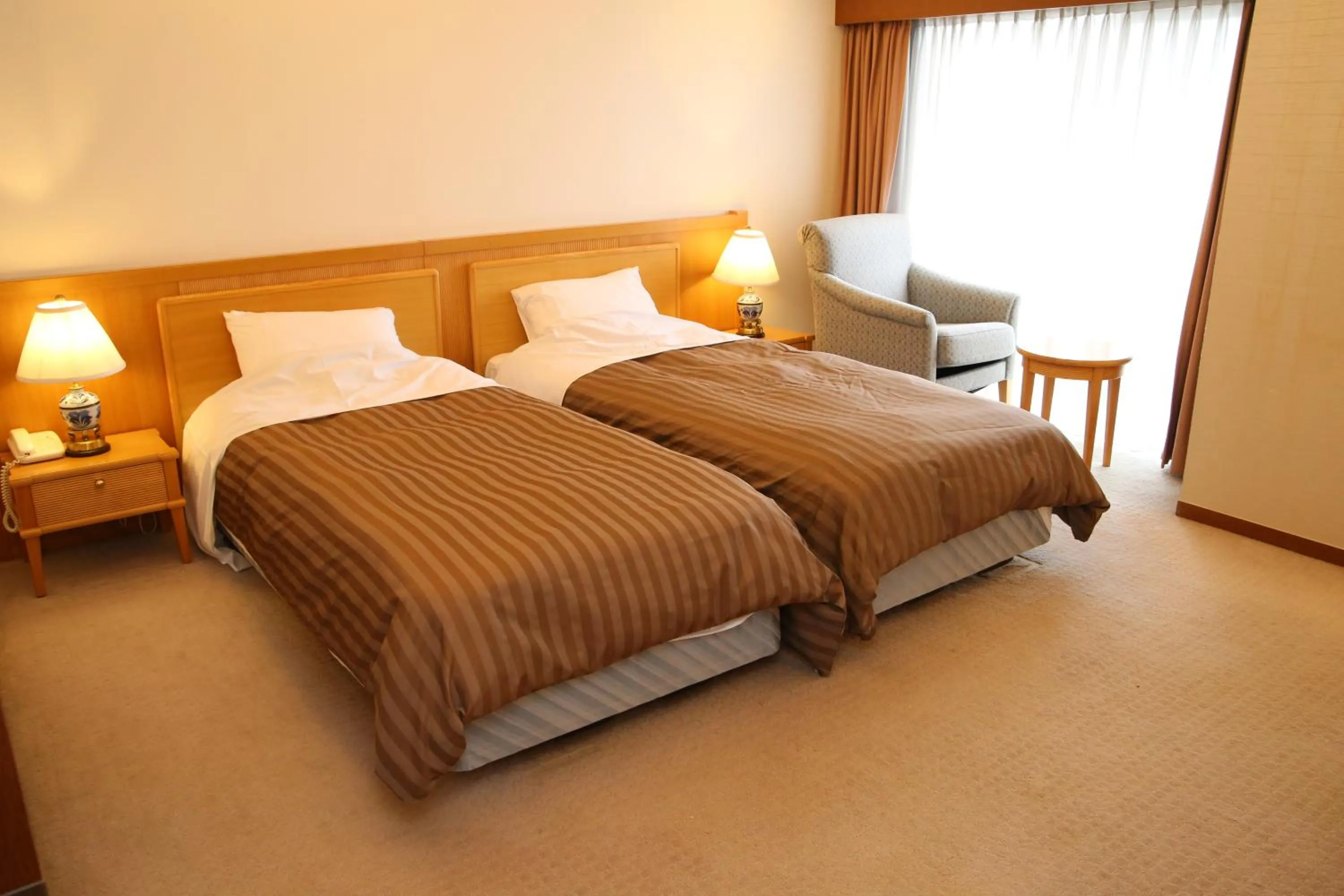 Bed in Nishiizu Crystal View Hotel