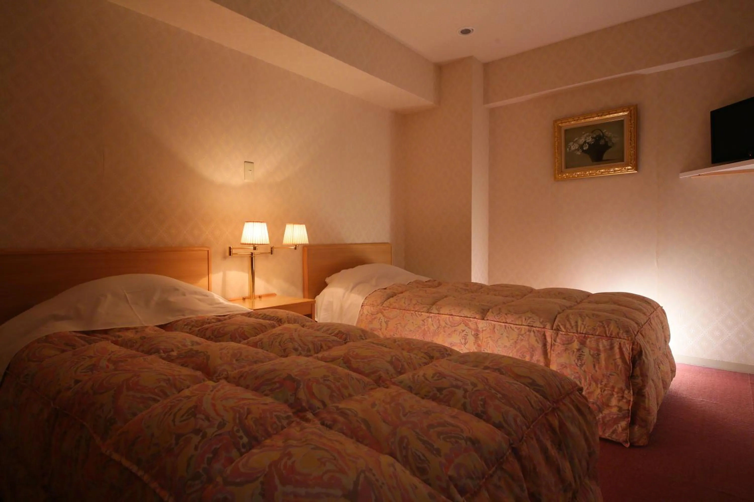 Bed in Nishiizu Crystal View Hotel