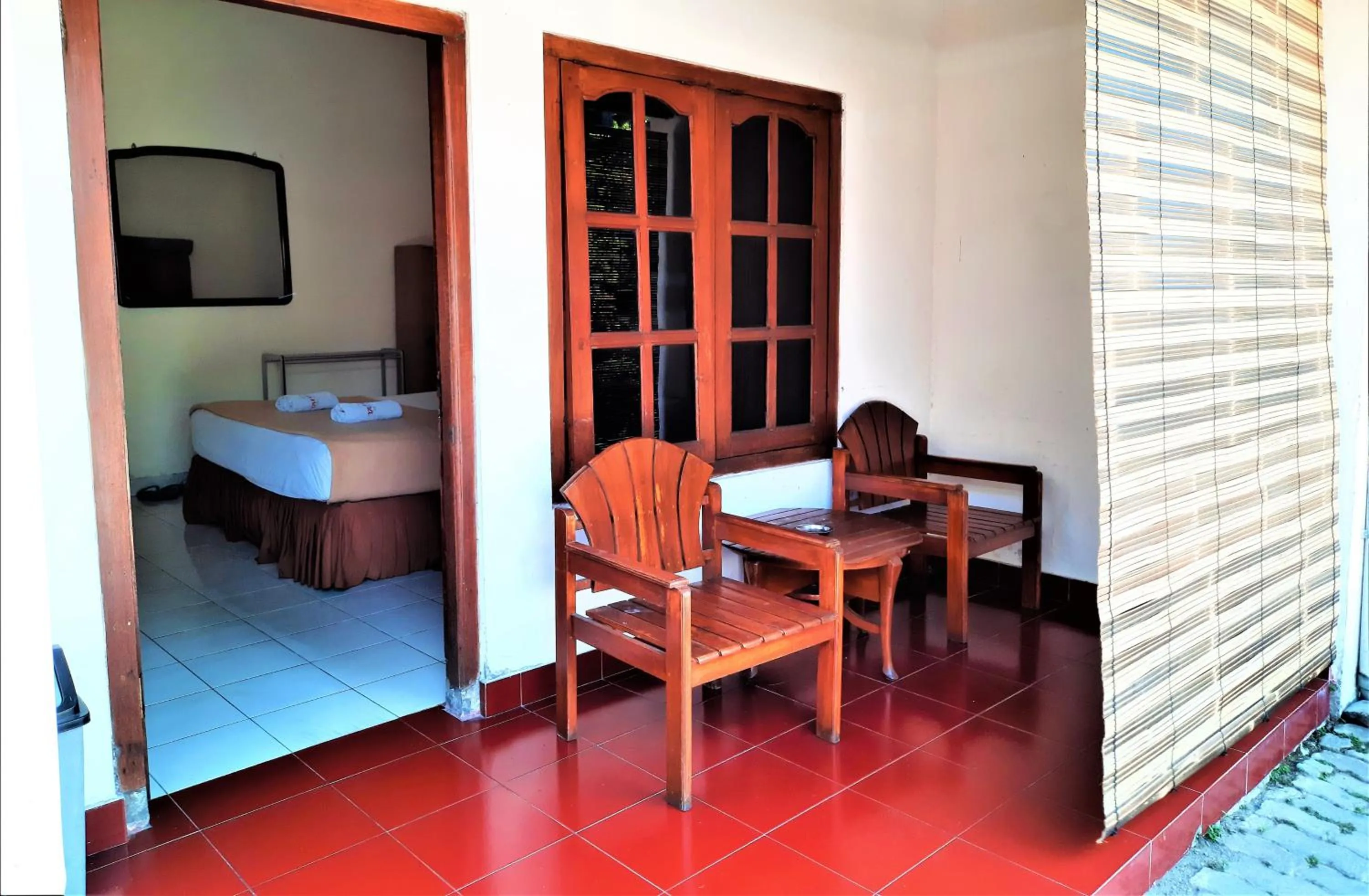 Balcony/Terrace, Bed in Hotel Perdana