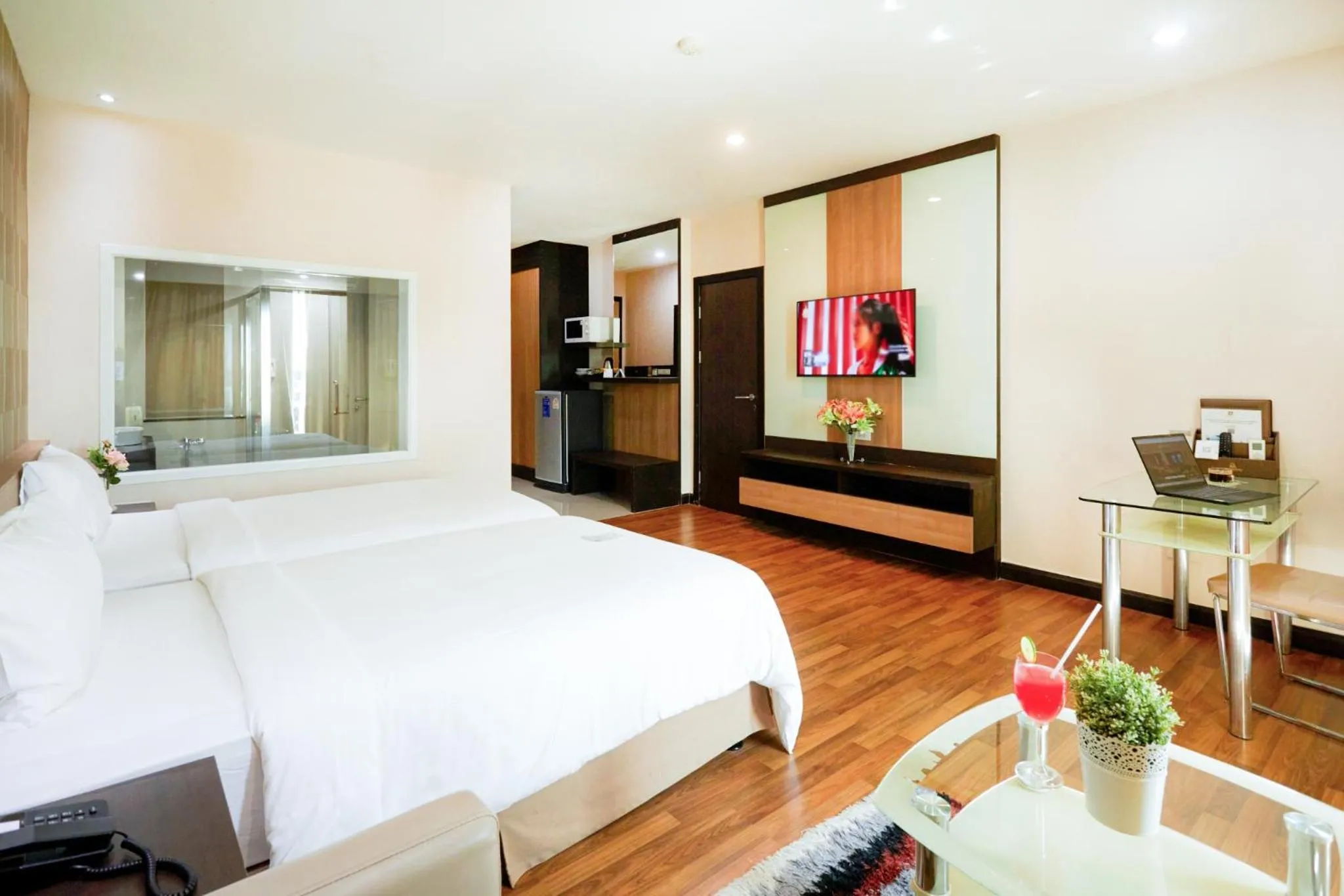 Bed in Golden City Rayong Hotel