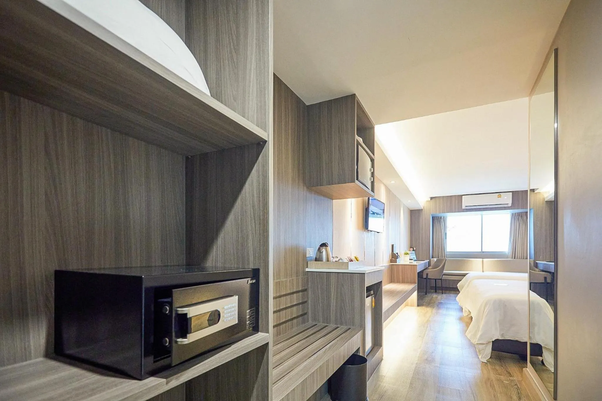 Bed in Golden City Rayong Hotel